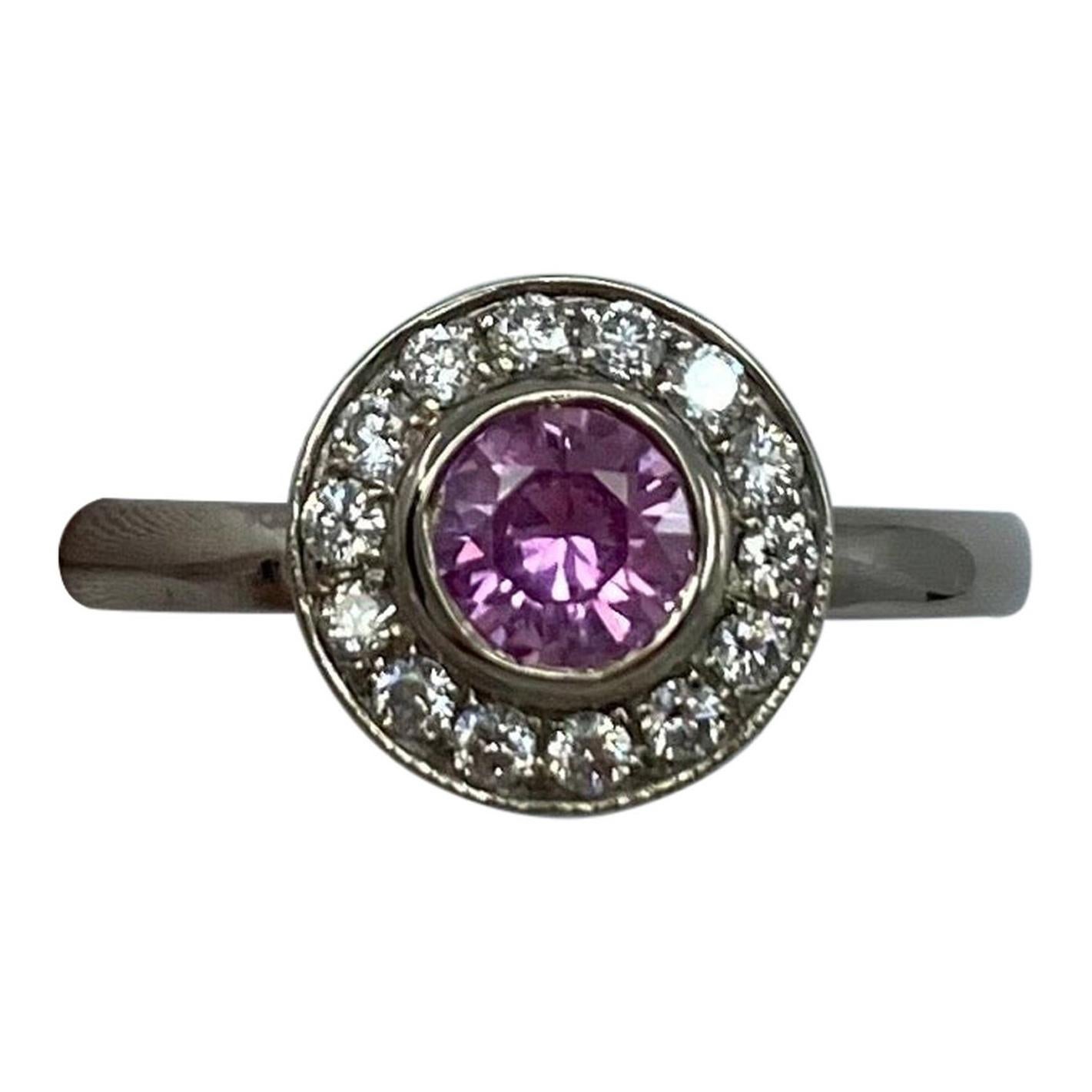 1.00 Carat Vivid Pink Sapphire and Diamond 18 Karat White Gold Halo Ring For Sale