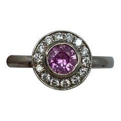 1.00 Carat Vivid Pink Sapphire and Diamond 18 Karat White Gold Halo Ring