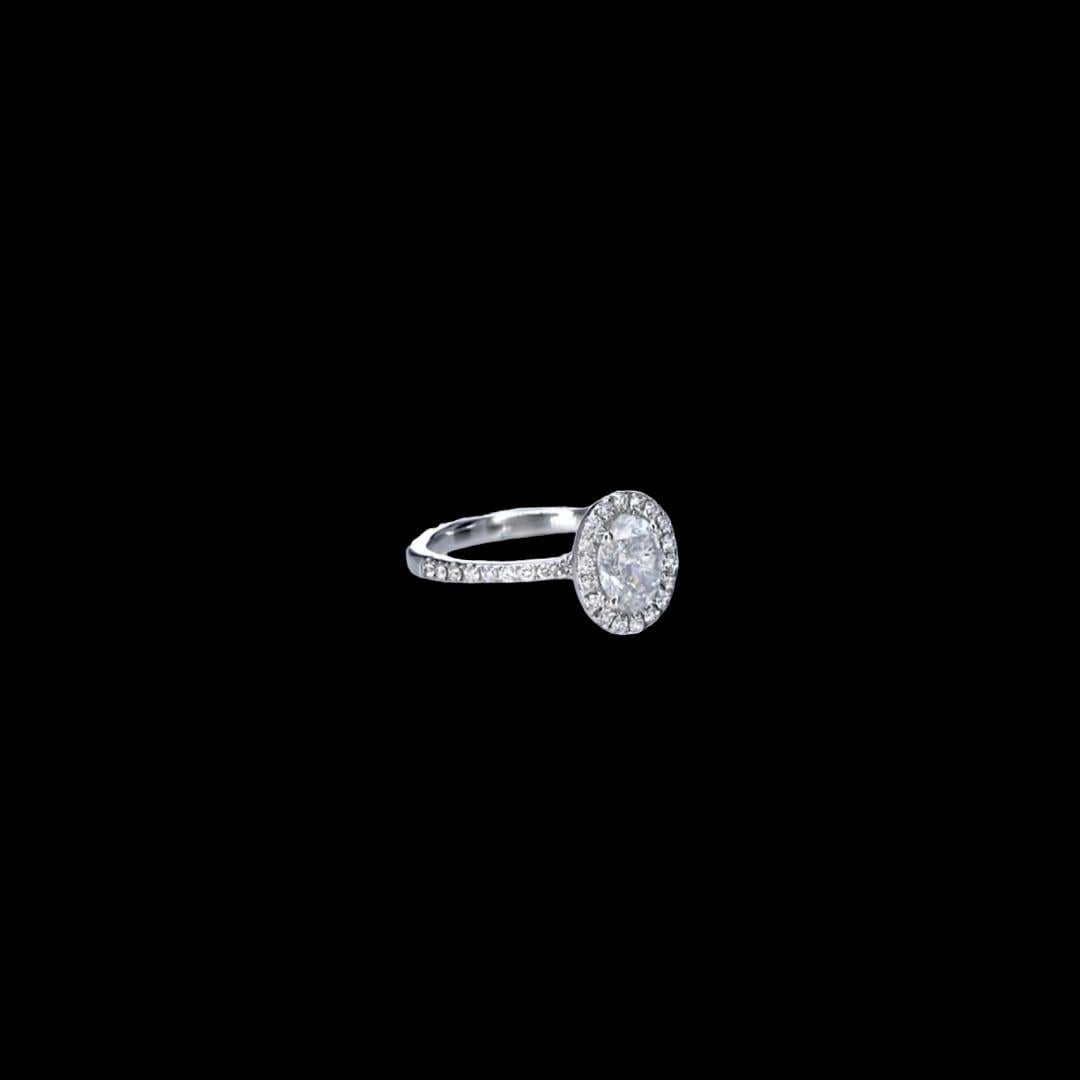 Oval Cut 1.00 Carat White Diamond Ring SI2 Clarity IGI Certified For Sale