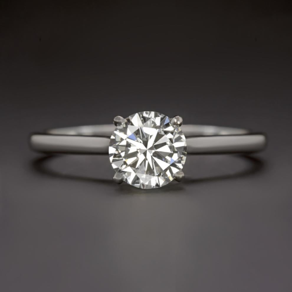 Beautiful solitaire ring with a brilliant and vibrant 1.00 ct EGL certified round brilliant cut diamond set in a classic 14k white gold setting. The diamond is certified by EGL-USA, and is classified D for color and is brilliant and colorless. It is