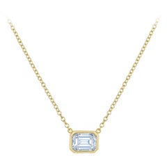 GIA certified 1.00 carat F VS2 emerald cut diamond East-West pendant