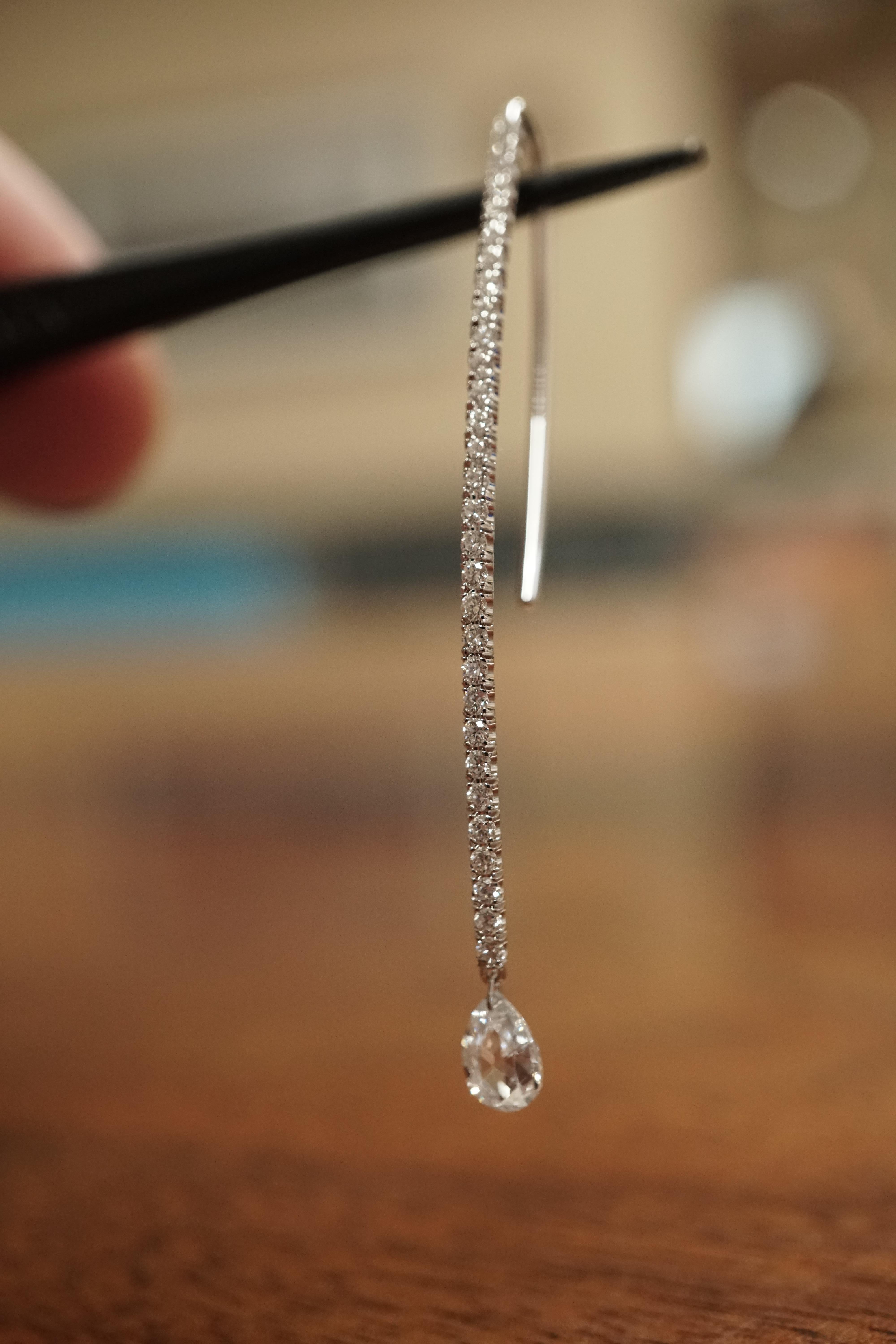 Dangling Pear Shaped Briolette Earrings in with 1.7 carats total white diamonds set in 18K white gold. Total weight: 3.15 grams.This piece is open for custom order, price may vary depending on modifications such as, quality and material. Proudly