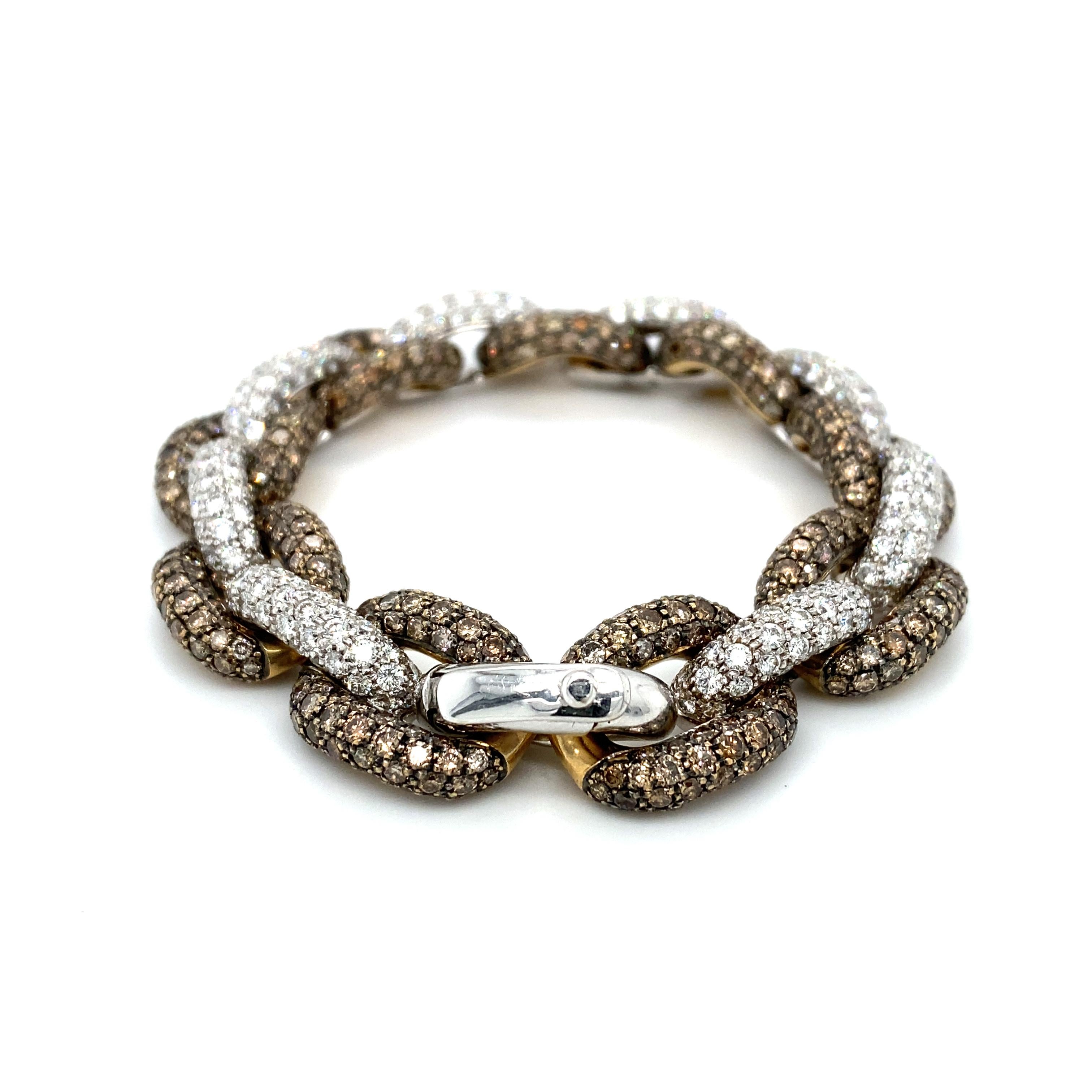 Item Details: This spectacular chain bracelet is studded with brilliant diamonds, both colorless and fancy brown. The total carat weight is over 20.0 carats. This bracelet is an excellent statement piece and the craftsmanship is impeccable.

Circa: