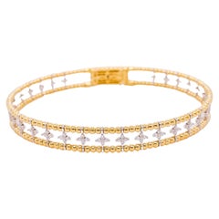 Bracelet jonc flexible en or jaune 14 carats avec 100 diamants en forme de trèfle 