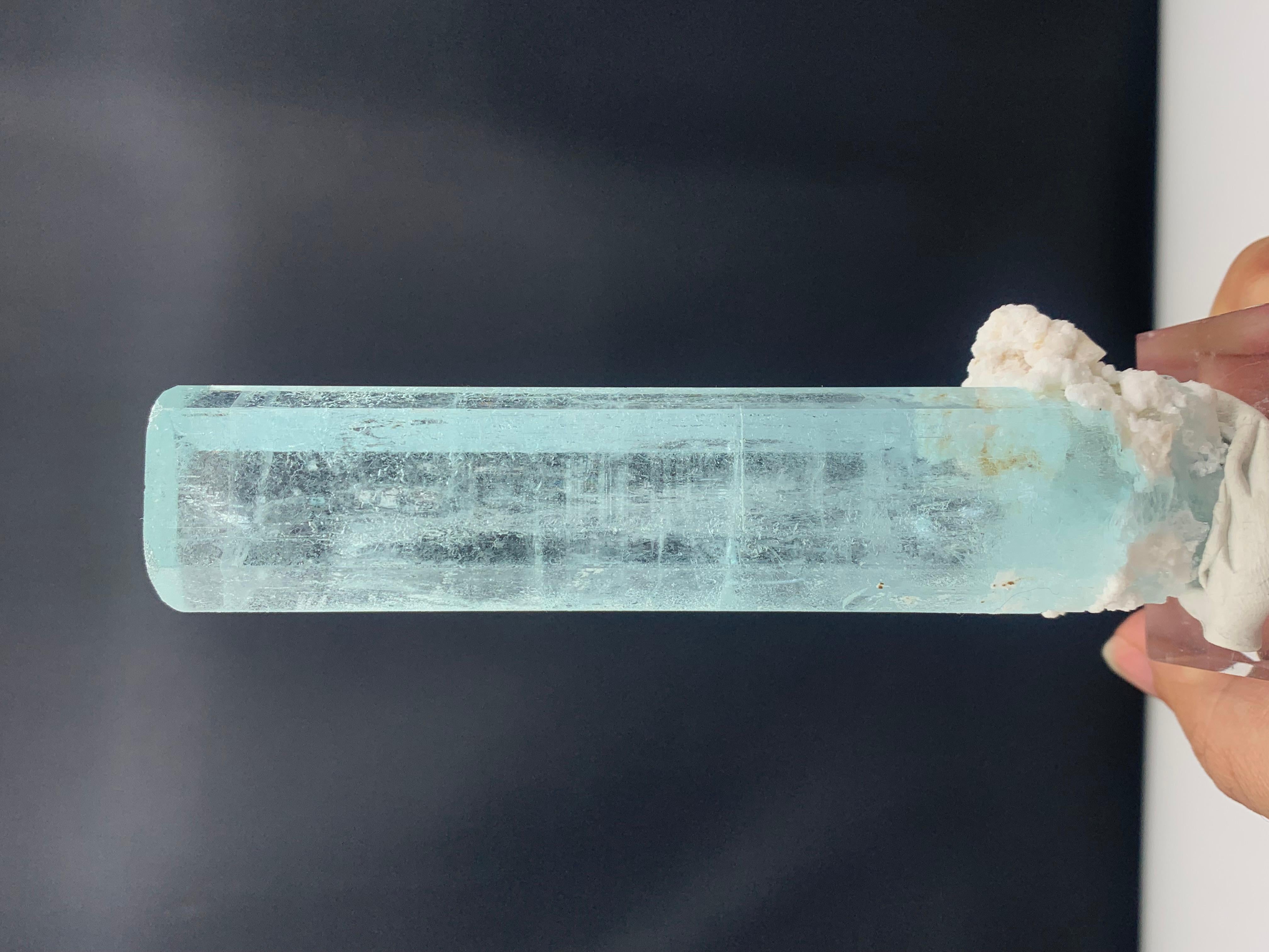 Stunning Natural Aquamarine Specimen From Nagar Valley, Pakistan 
WEIGHT: 100 gram
DIMENSIONS: 11.5 x 2.4 x 1.7 Cm
ORIGIN: Nagar Valley, Gilgit Baltistan Pakistan 
TREATMENT: None
Aquamarine is a pale-blue to light-green variety of beryl. The