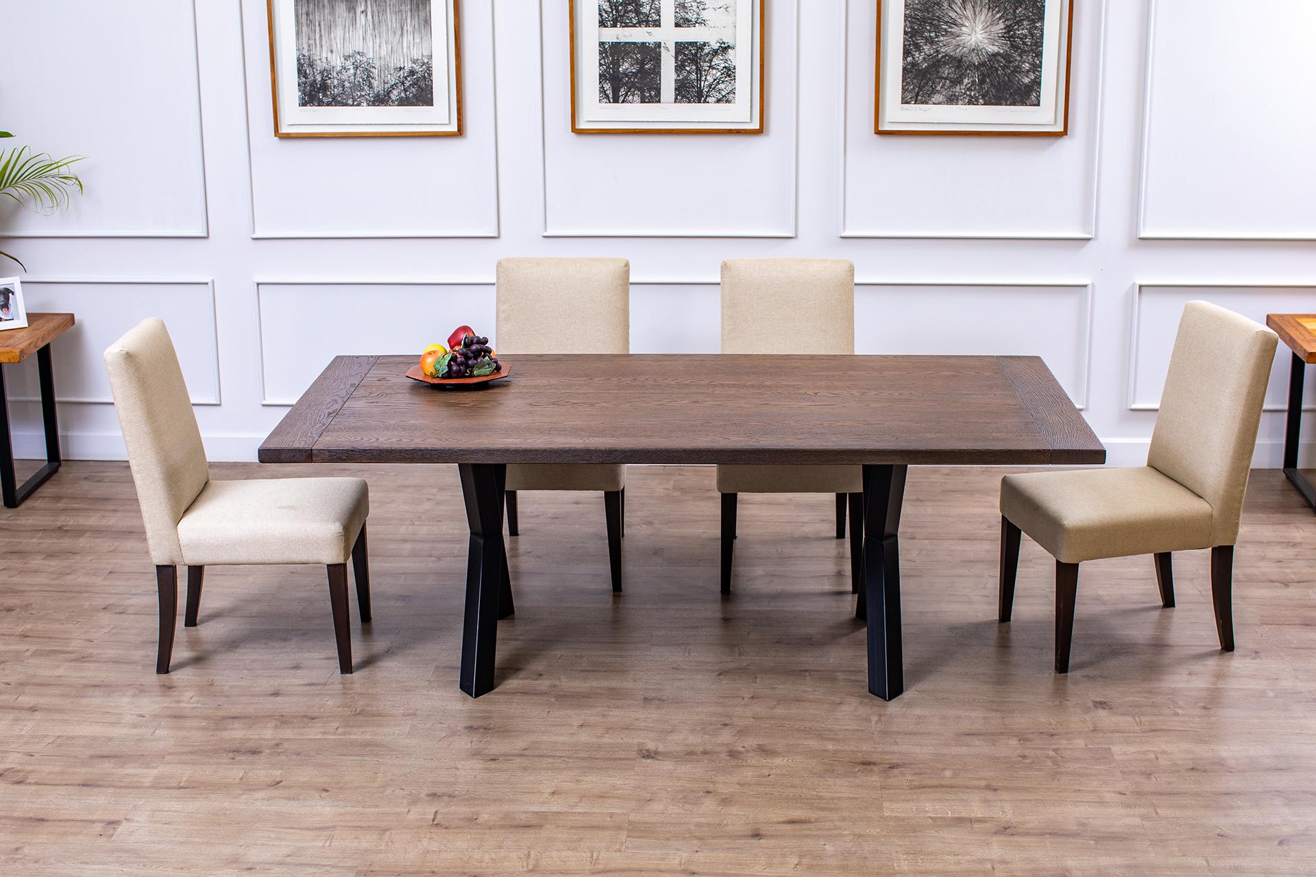 This handcrafted solid teak dining table is a masterpiece of timeless beauty and exceptional craftsmanship. Made from solid Burmese Golden Teak, this dining table showcases the natural elegance and durability of this exquisite hardwood.

Each table