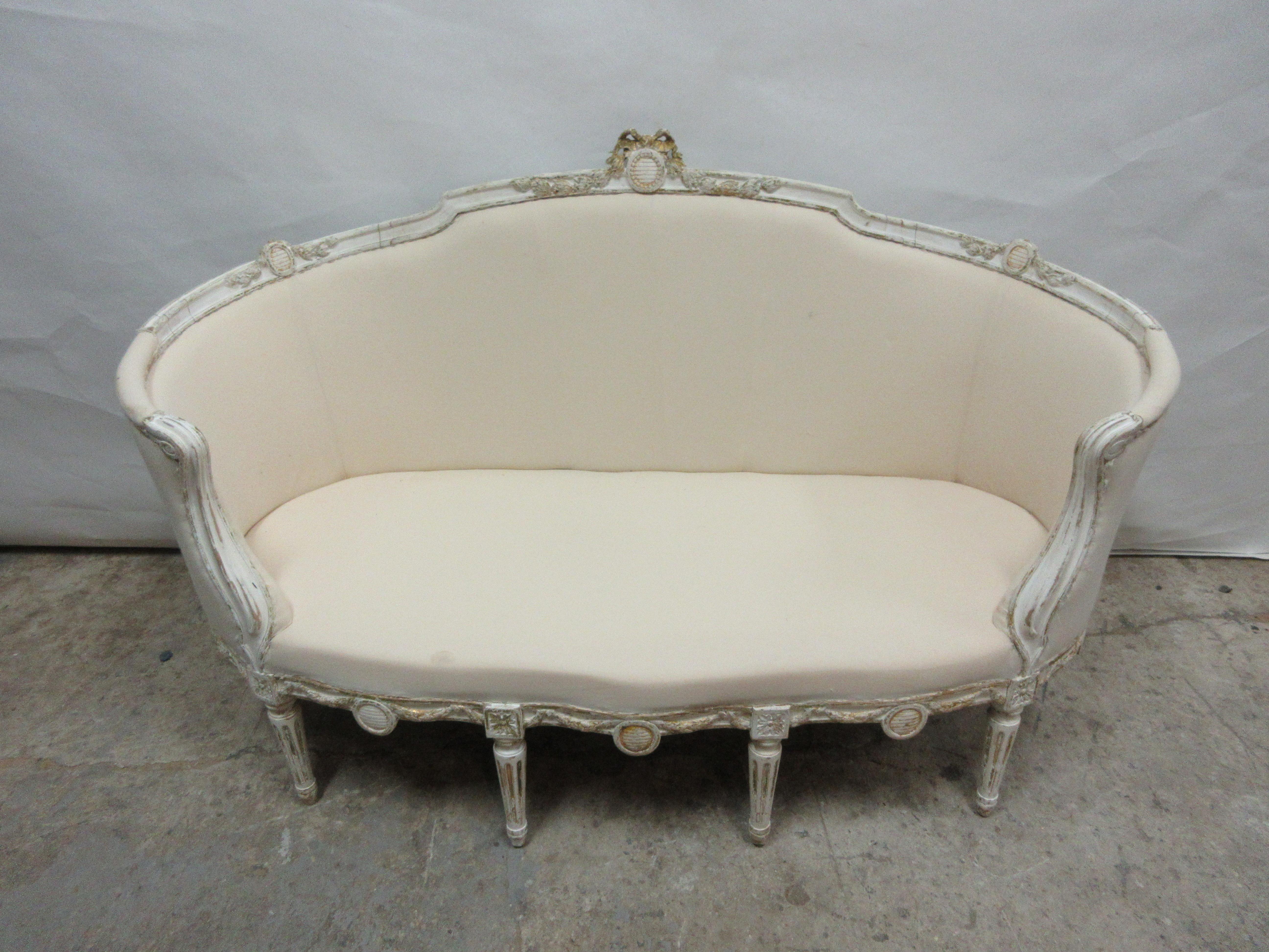 This is a 100% original painted Swedish Gustavian barrel sofa. The seating has been restored and covered in Muslin.