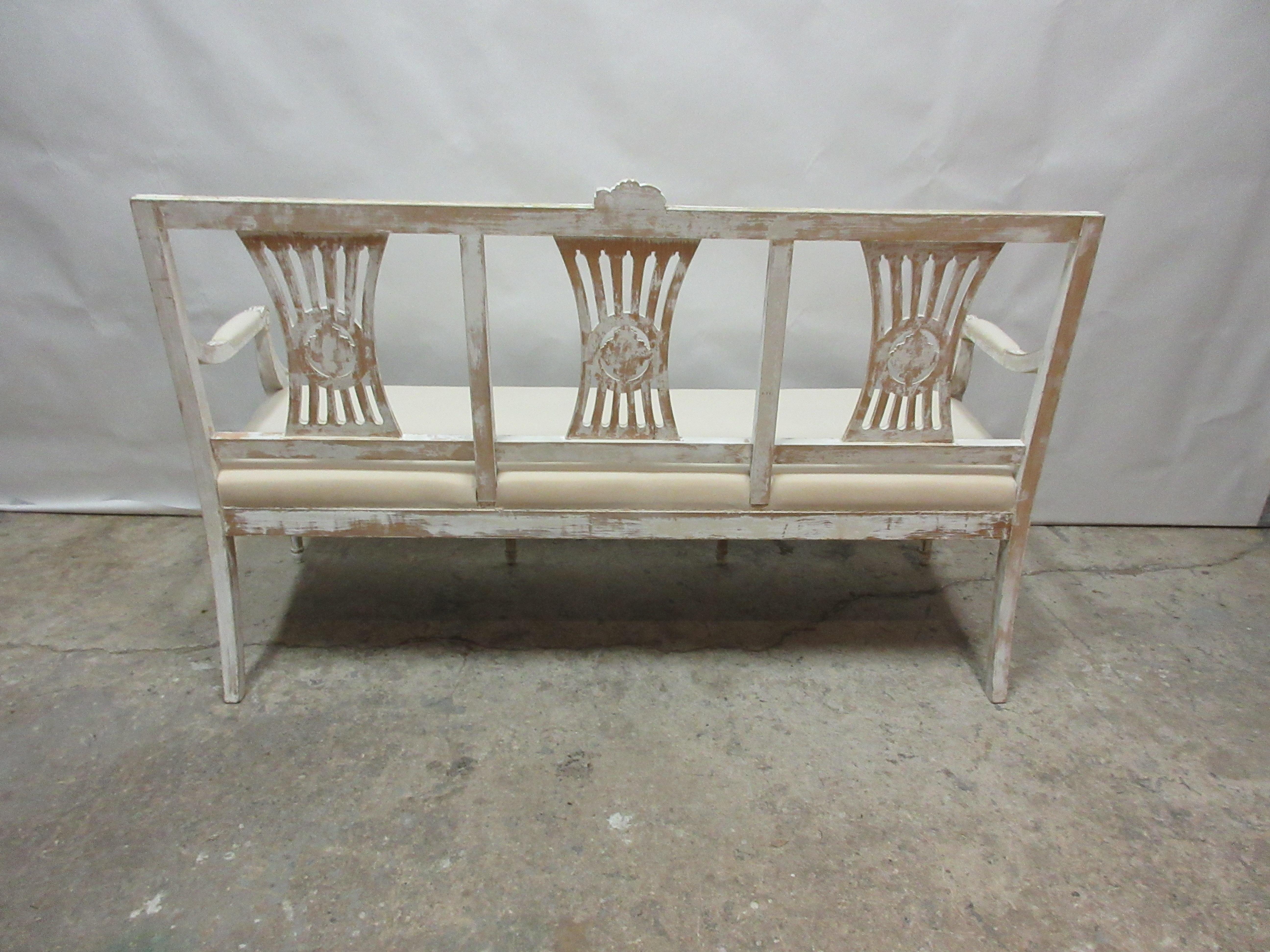 This is a 100% original painted Swedish Gustavian settee. the seating has been restored and covered in Muslin.
Arm height 26 inches.