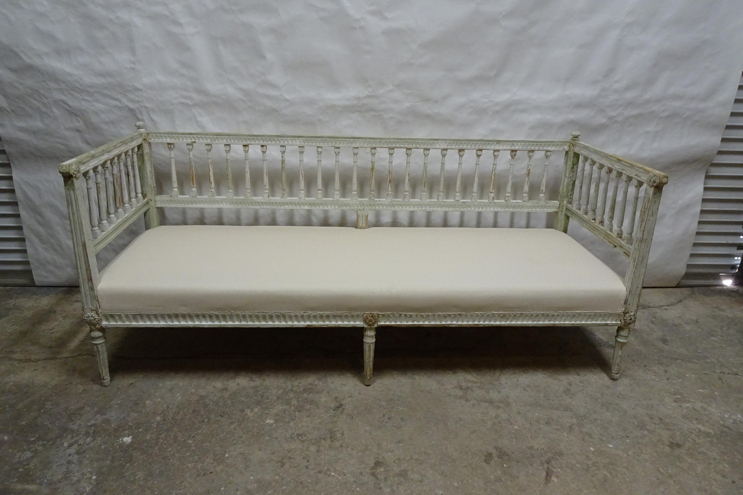 This is a Beautiful 100% Original Painted Swedish Gustavian Sofa. the seatinghas been restored and recovered in Muslin.