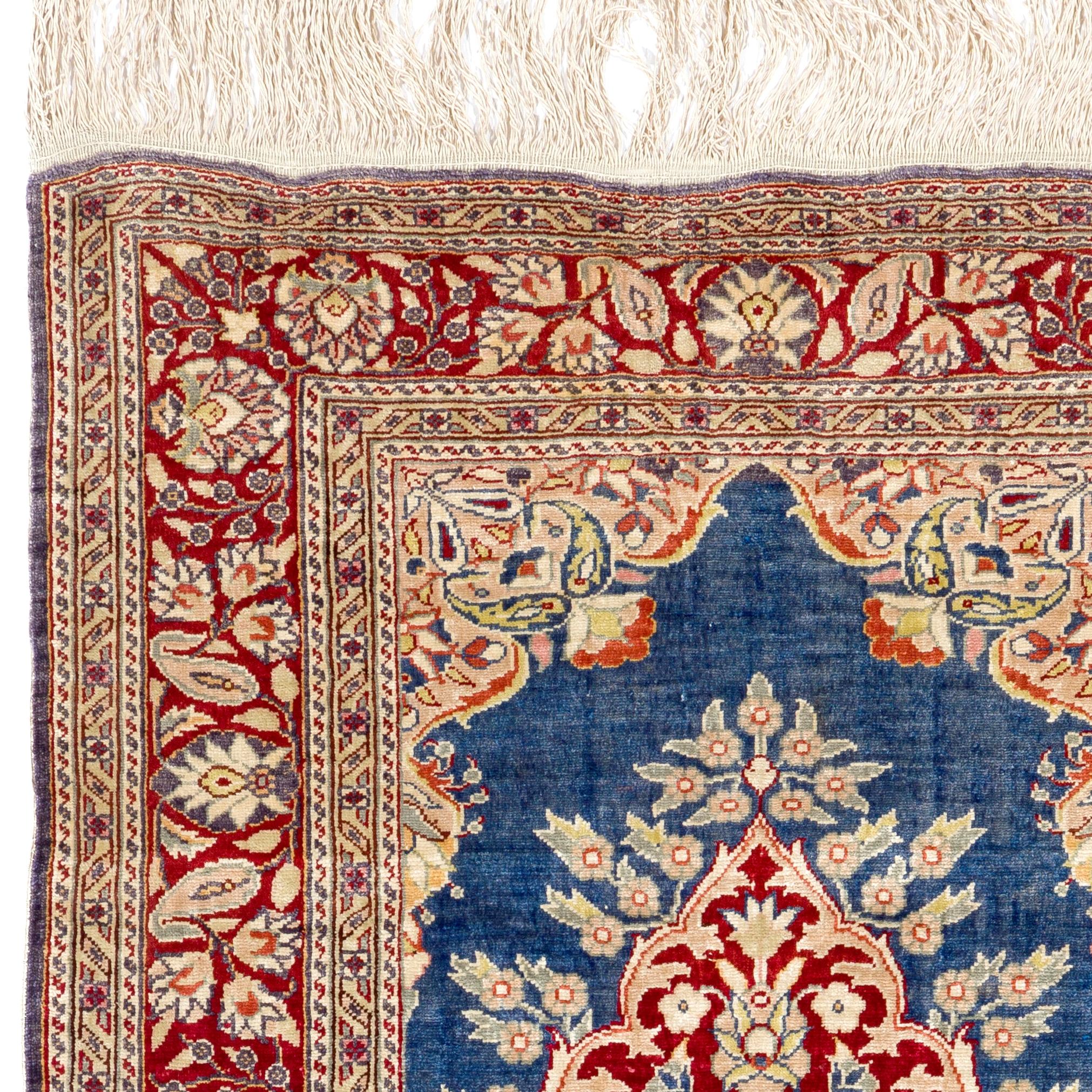 100% silk vintage handmade Kayseri rug. This extremely finely woven silk rug can bring a sublime, palatial quality to any formal interiors. The shimmering patina and the soft, delicate, velvet-like feel of a handwoven silk rug are truly delightful