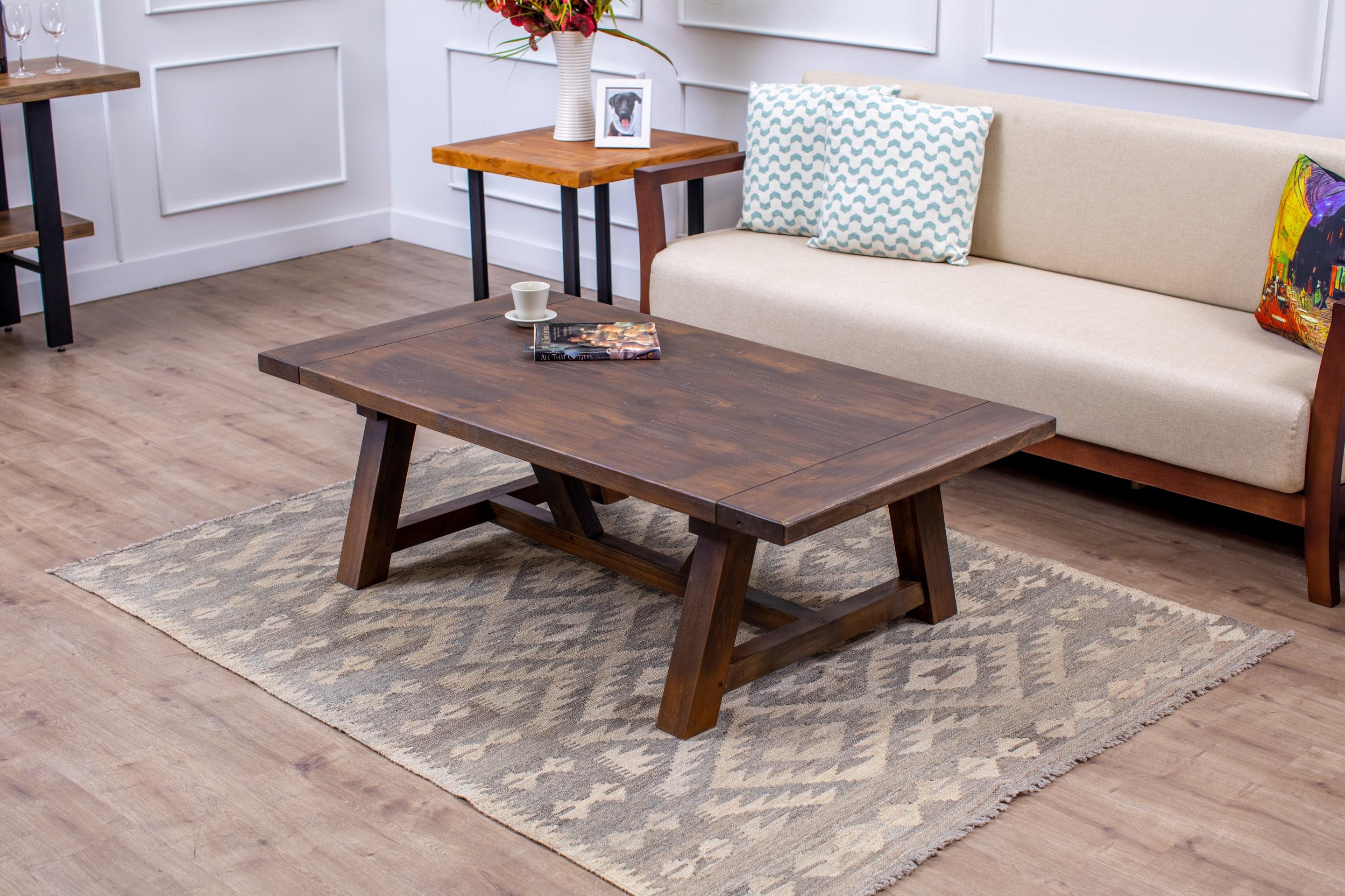 The hand-built rustic teak table emphasizes the elegance of simple design blended with quality craftsmanship, solid hardwoods, and a clean leg design. Its rustic, yet sophisticated appeal makes it an easy choice to add style and comfort to your
