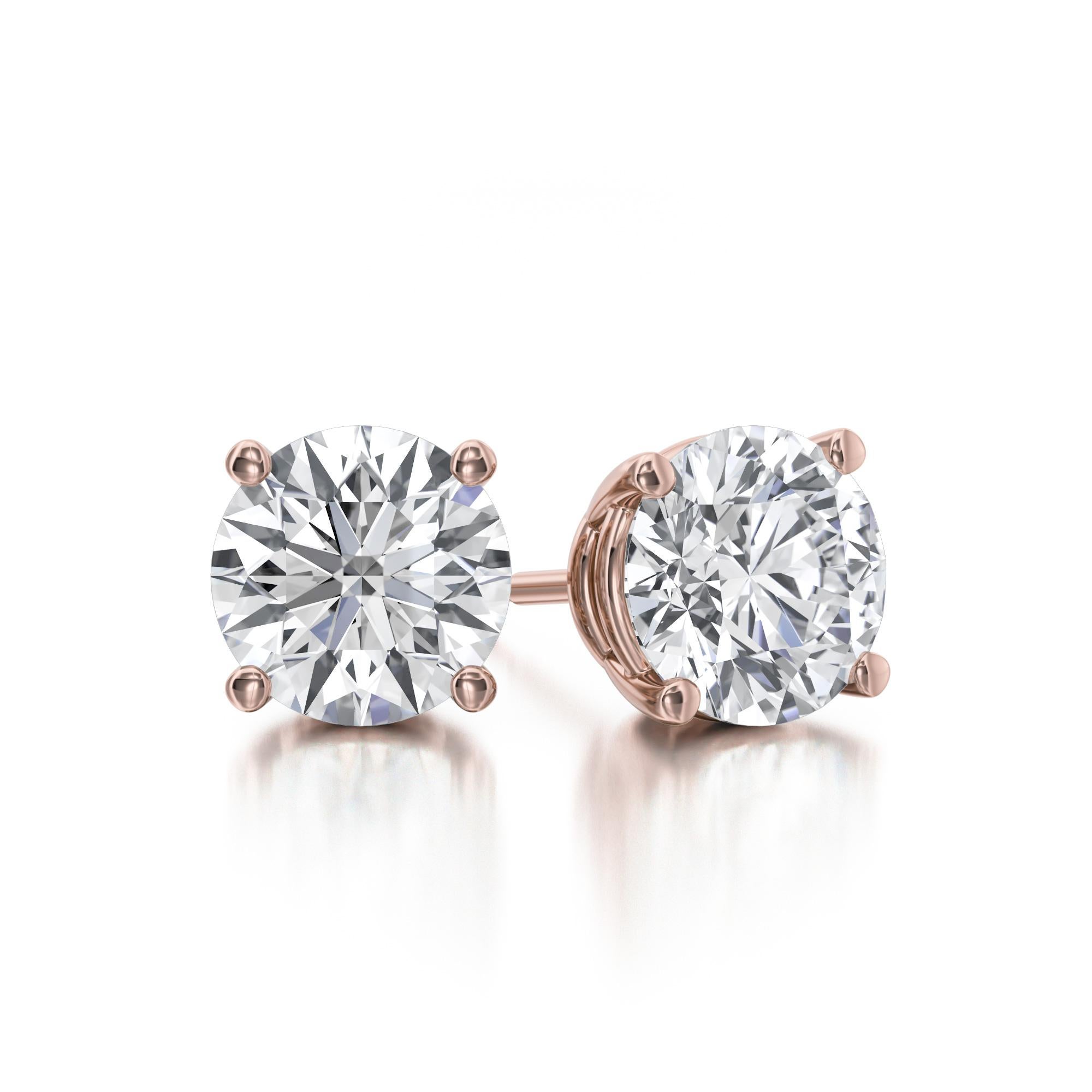 Classic Four Prong Diamond Stud Earrings, featuring:
✧ 2 natural diamonds G-H color SI weighing 1.00 carats 
✧ Measurements: 5.00mm*5.00mm
✧ Available in 14K Rose Gold
✧ Push back friction closure
✧ Free appraisal included with your purchase
✧ Comes