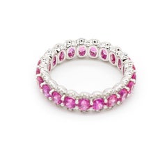 1.00 TCW Round Cut Ruby Prong Set Diamond Eternity Band Ring in 18 k Gold White