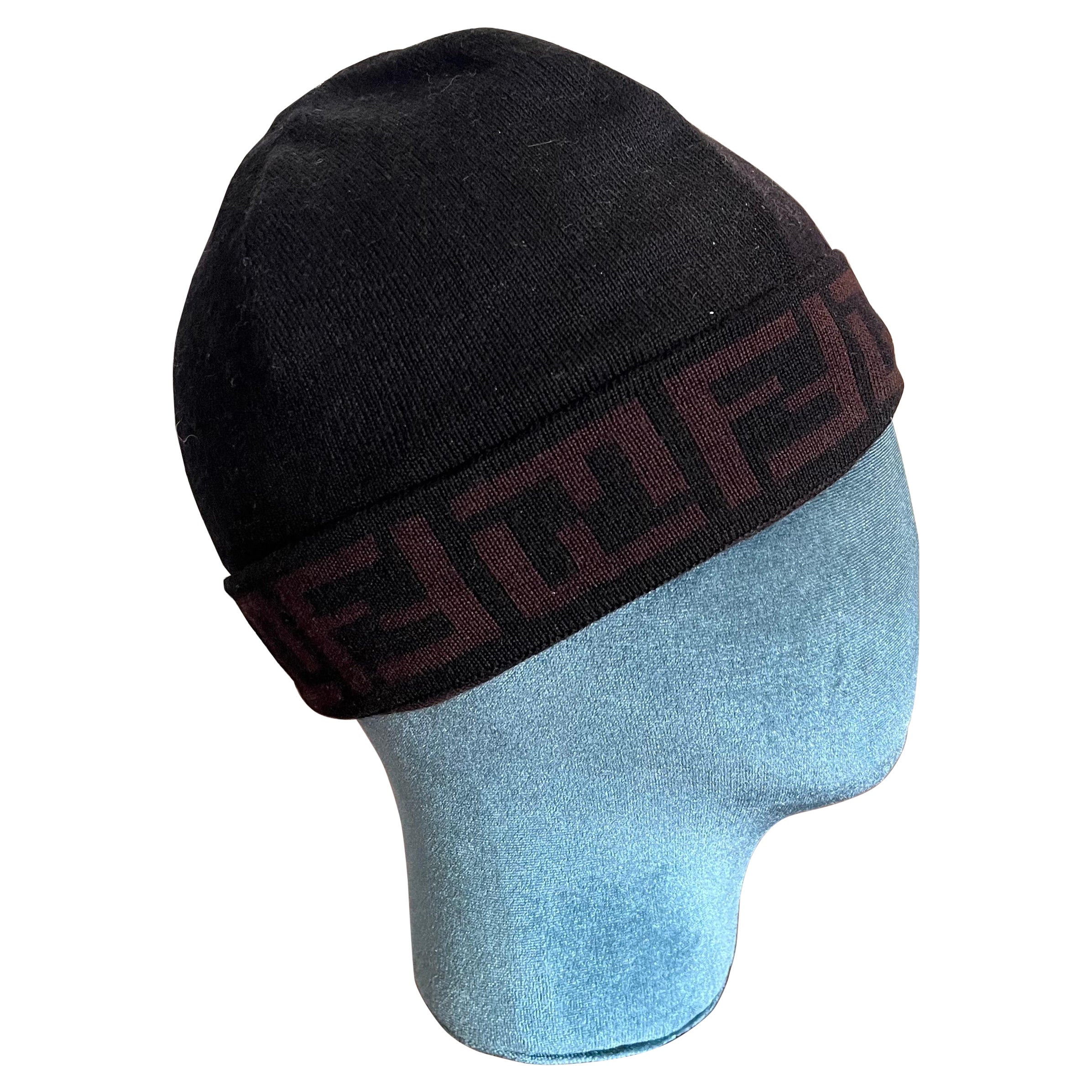 100% wool Fendi stretch hat with logo trim. For Sale