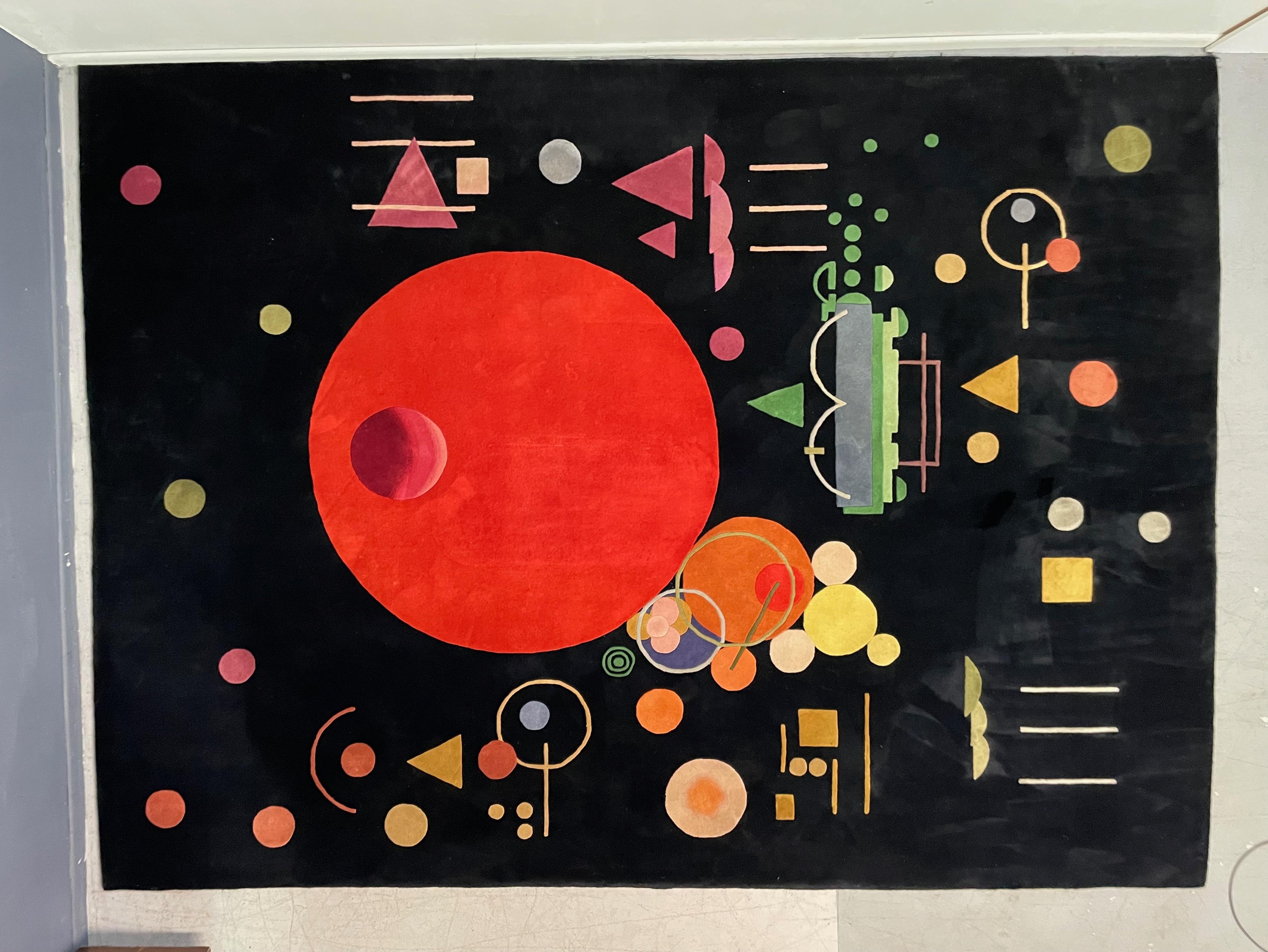 This is an all-wool modernist Bauhaus style area rug inspired by artist Wassily Kandinsky. Crafted in Denmark circa 1988 as part of the 20th Century Collection by Ege Axminster Art Line. An attractive decorative art work as either an area rug or a