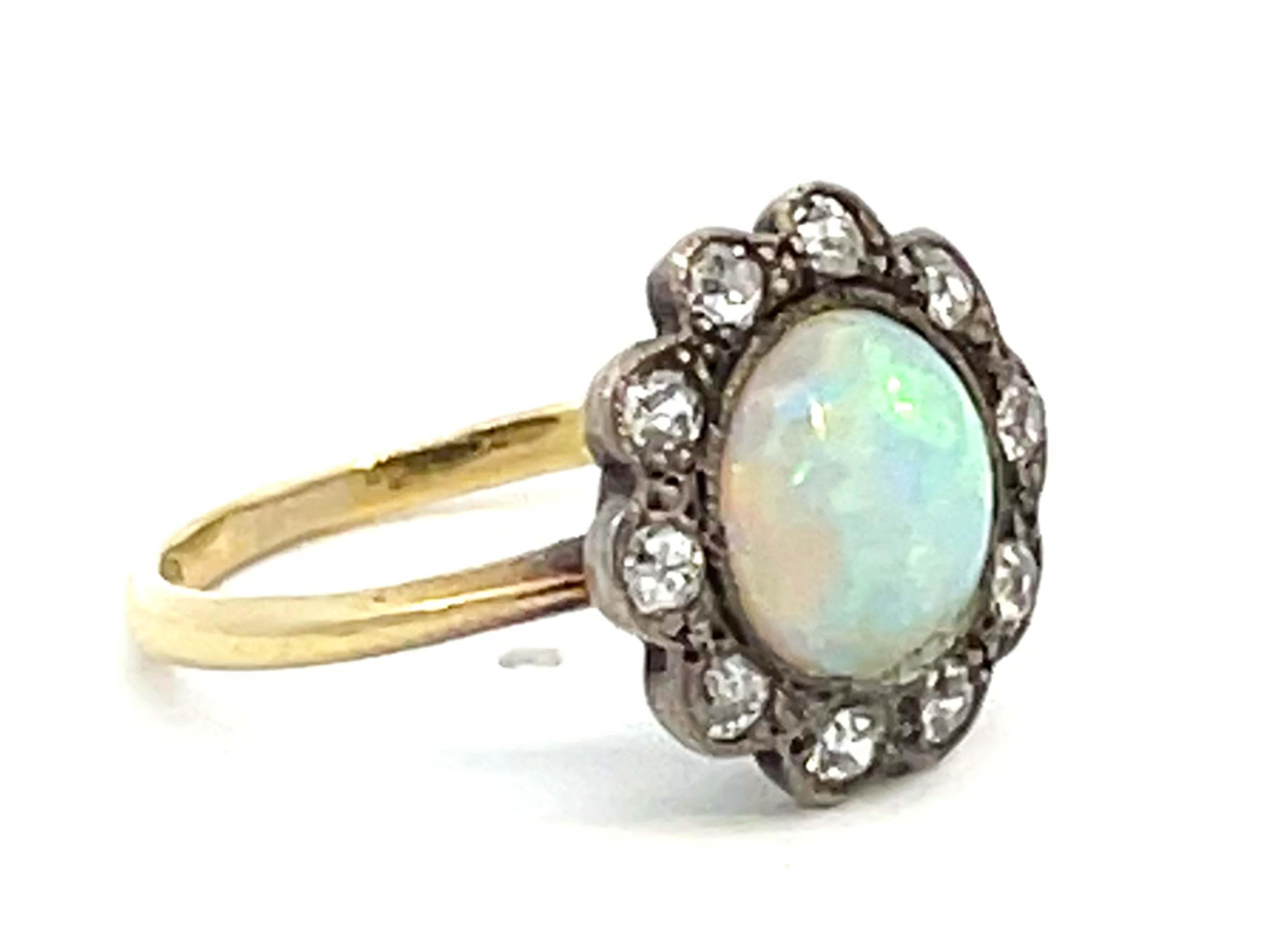 Old European Cut 100 Year Old Antique Edwardian Era Opal and Diamond Flower Halo Ring For Sale