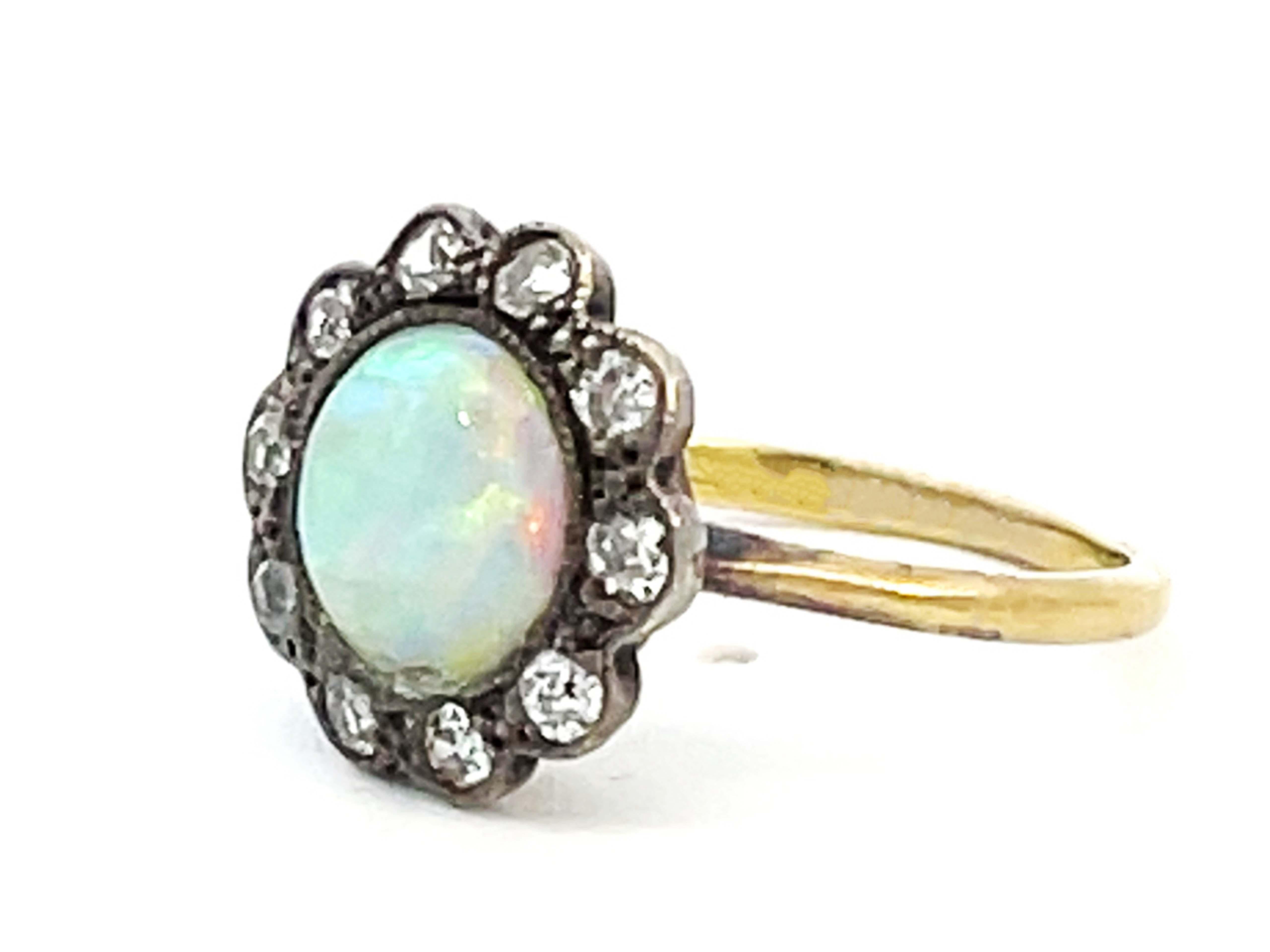 100 Year Old Antique Edwardian Era Opal and Diamond Flower Halo Ring In Good Condition For Sale In Honolulu, HI