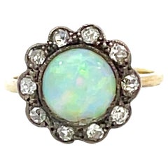 100 Year Old Vintage Edwardian Era Opal and Diamond Flower Halo Ring