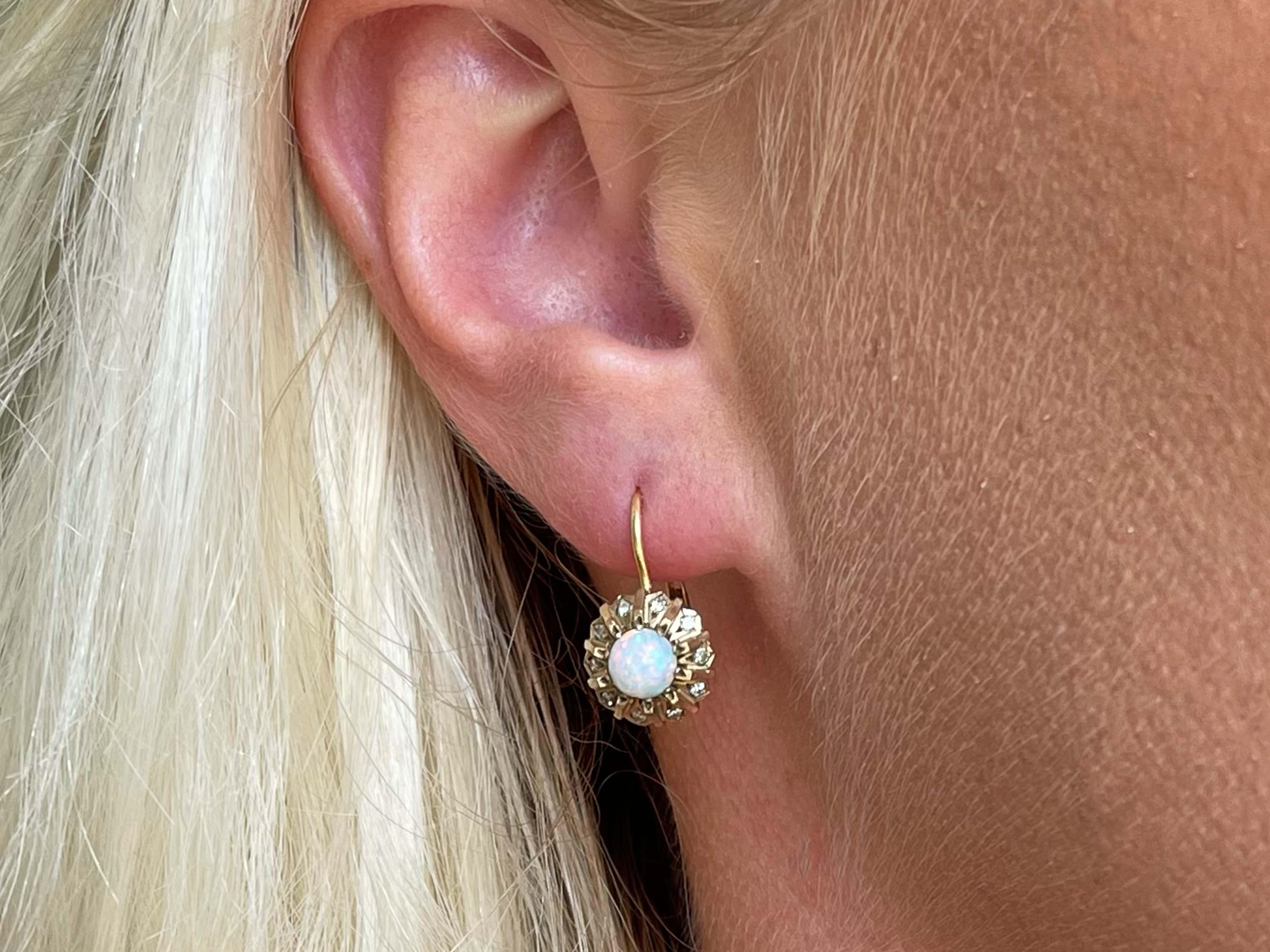 Earrings Specifications:

Metal: 14K Yellow Gold

Total Weight: 4.1 Grams

Opal Diameter: 5 mm
​
​Diamond Color: H-I
​
​Diamond Count: 20 Single cut diamonds
​
​Diamond Clarity: SI1-SI2
​
​Diamond Carat Weight: ~0.10 carats
Condition: Preowned, Very