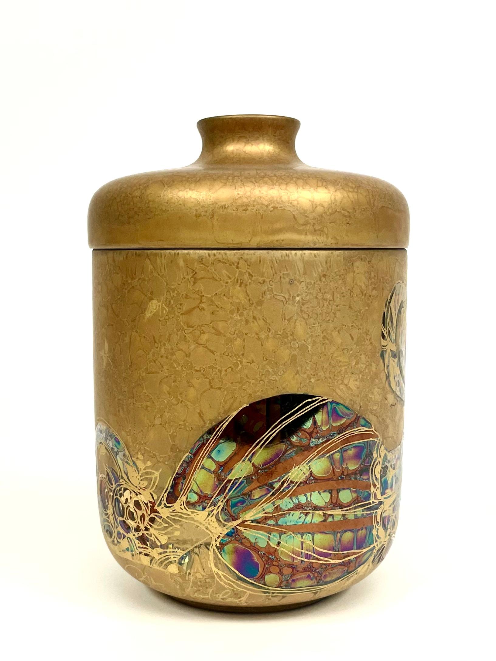 This is a beautiful German porcelain jar with lid from Rosenthal, designed 1979 by Bjørn Wiinbladh, Denmark for the company’s 100-years anniversary. 
It comes hand painted and partly metal gilded. 

The jar including lid:
Ø 9.5 cm. 
H 15 cm.