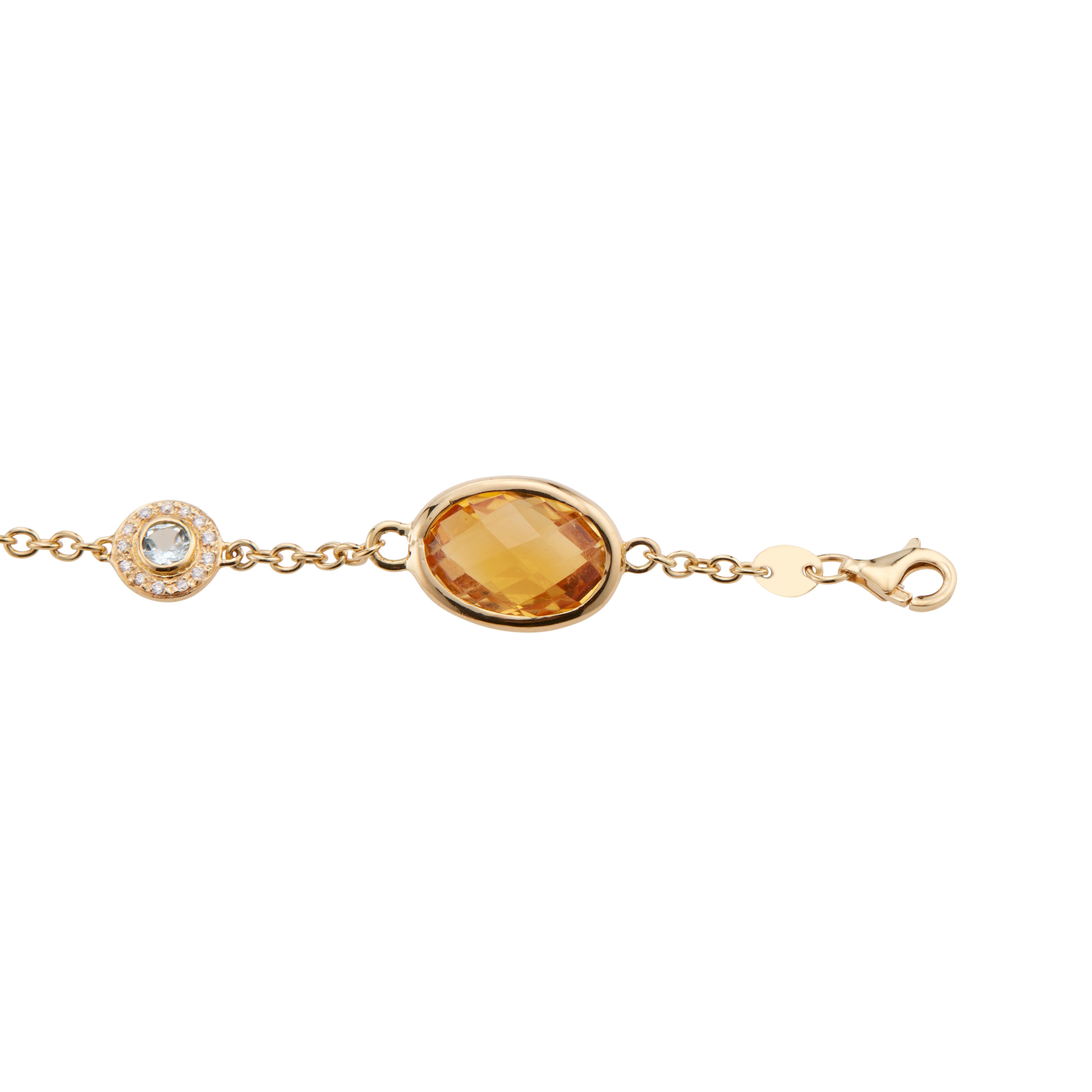 Contemporary Citrine, aqua and diamond 18k yellow gold link bracelet. Signed KMcD. 3 oval citrines accented with 3 aquamarines, each with halos of diamonds. 7.25 inches in length. 

3 oval yellowish orange quilted citrines, approx. 10.00cts
3 round
