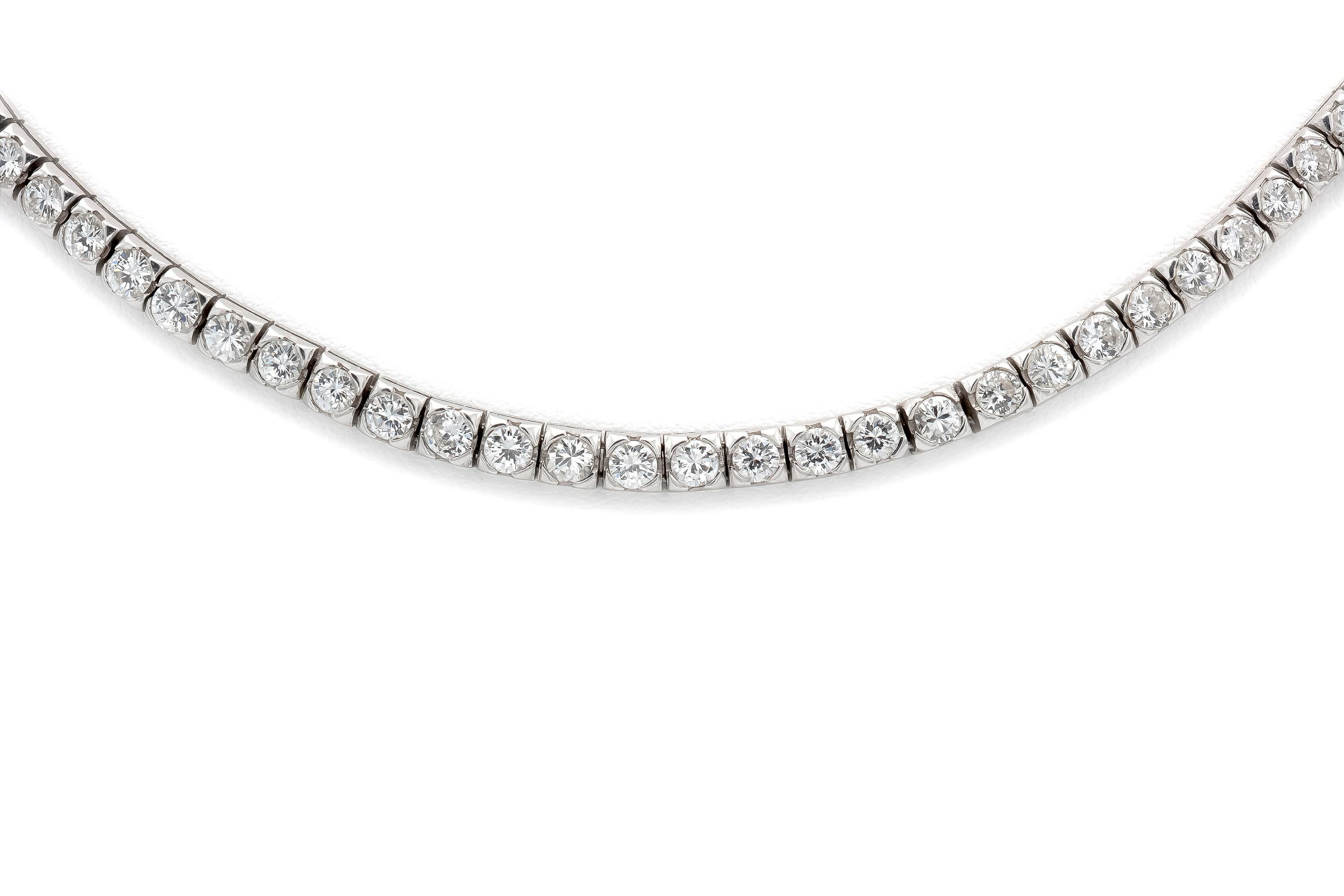 Finely crafted in platinum featuring diamonds all the way around weighing a total of 10.00 carats.