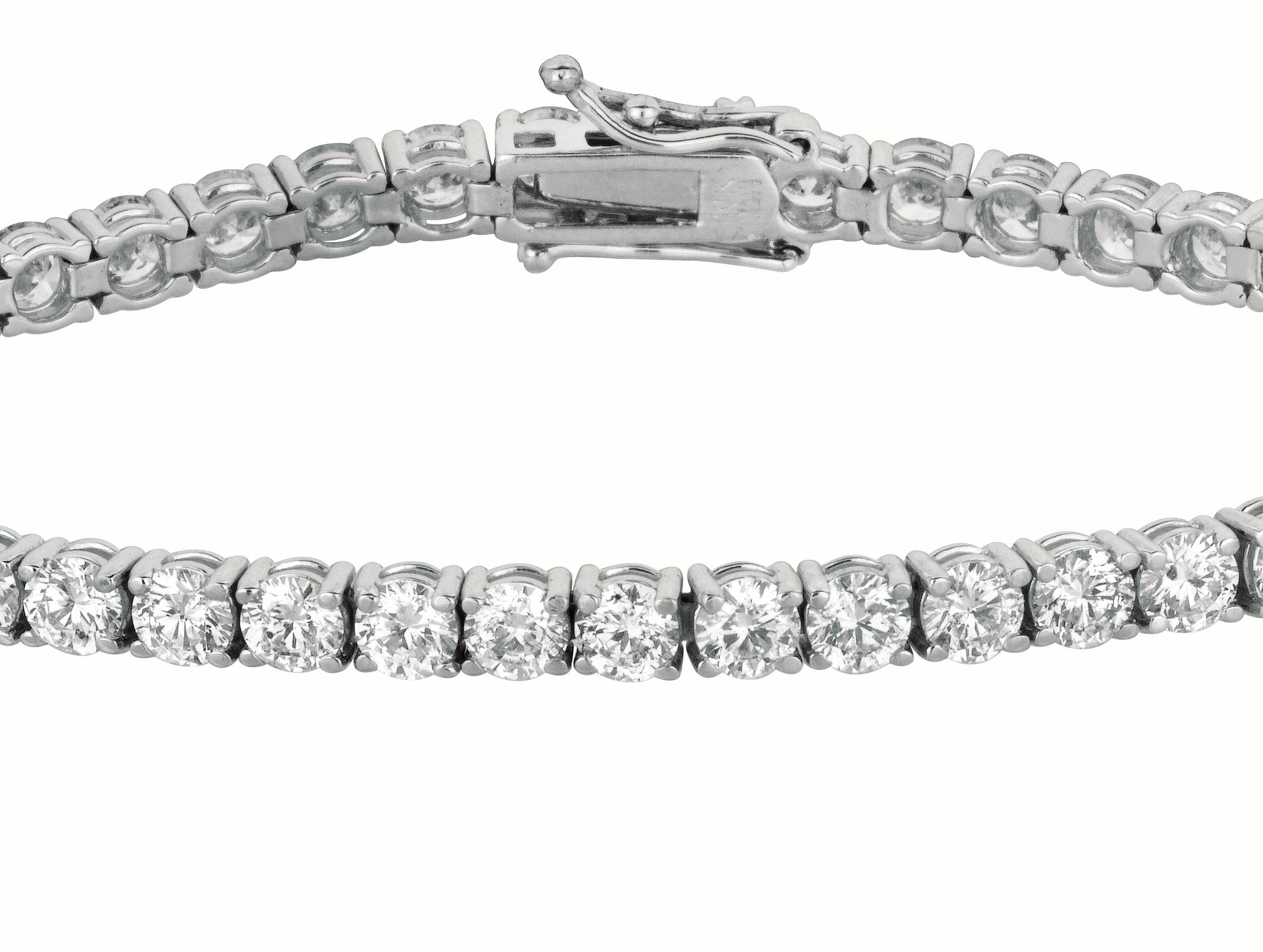 
10.00 Carat Diamond Tennis Bracelet G SI 43 stones 14K White Gold 7''

    100% Natural, Not Enhanced in any way Round Cut Diamond Tennis Bracelet 
    10.01CTW
    Color G-H 
    Clarity  SI  
    14K White Gold, Prong set
    7 inches in length,