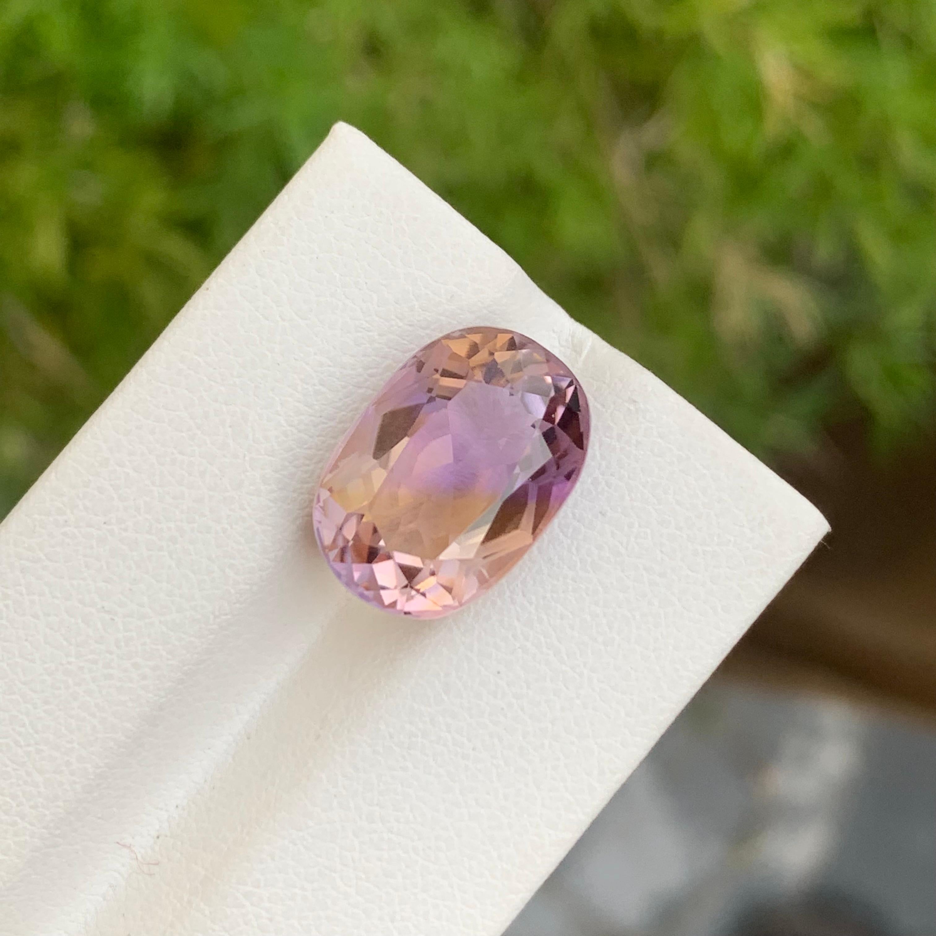 Faceted Ametrine
Weight: 10.00 Carats
Dimension; 16.1 x 11.2 x 8.6 Mm
Origin: Brazil
Color: Purple & Yellow
Shape: Oval 
Treatment: Non
Certficate: On Demand
.
Ametrine is a unique and captivating gemstone that displays a harmonious blend of two