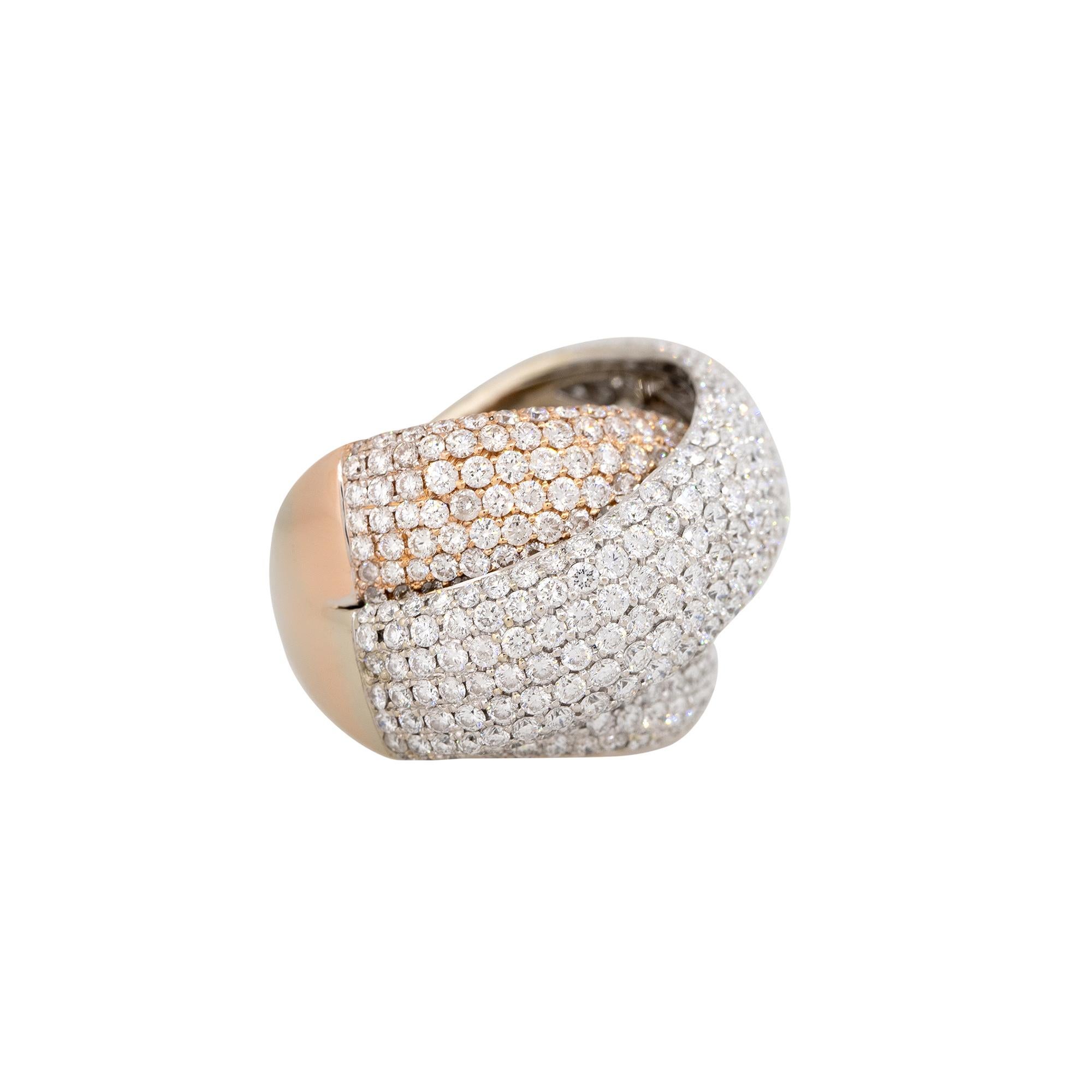 Anillo Cruzado Grueso de Oro Blanco y Rosa de 18k 10.00ctw Diamante Pave

¡Es una joya muy chula! Presenta un diseño cruzado con múltiples diamantes engastados. Este anillo es bicolor y tiene oro blanco de 18 quilates y oro rosa de 18 quilates. Los