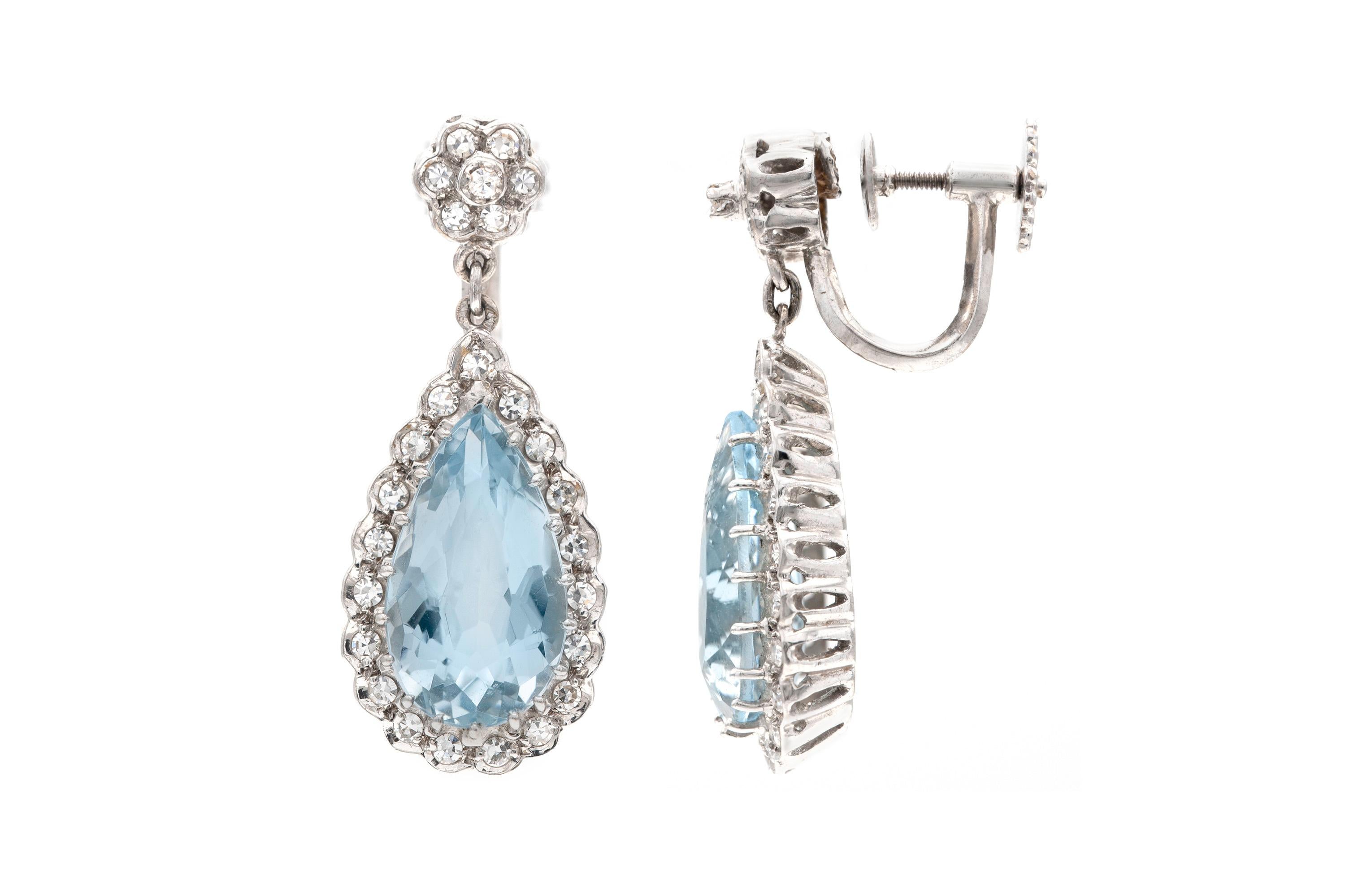Finely crafted in 14K white gold with two pear-shaped Aquamarines weighing approximately a total of 10.00 carats.
The earrings feature diamonds weighing approximately a total of 2.00 carats.