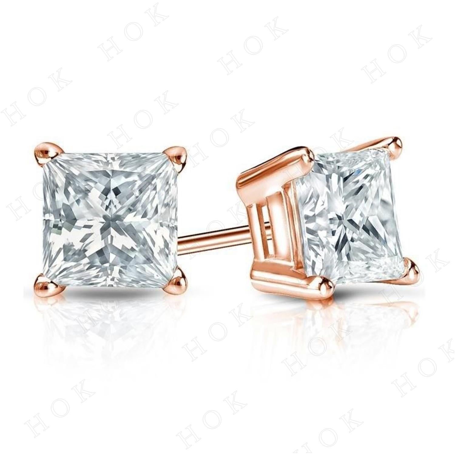 Each Stone is 5 carat which makes the total of 10 carat. The quality of the diamonds are H I color with SI clarity . The classic princess cut diamond stud earrings comes in three different settings. The first and second pictures are four prongs, the