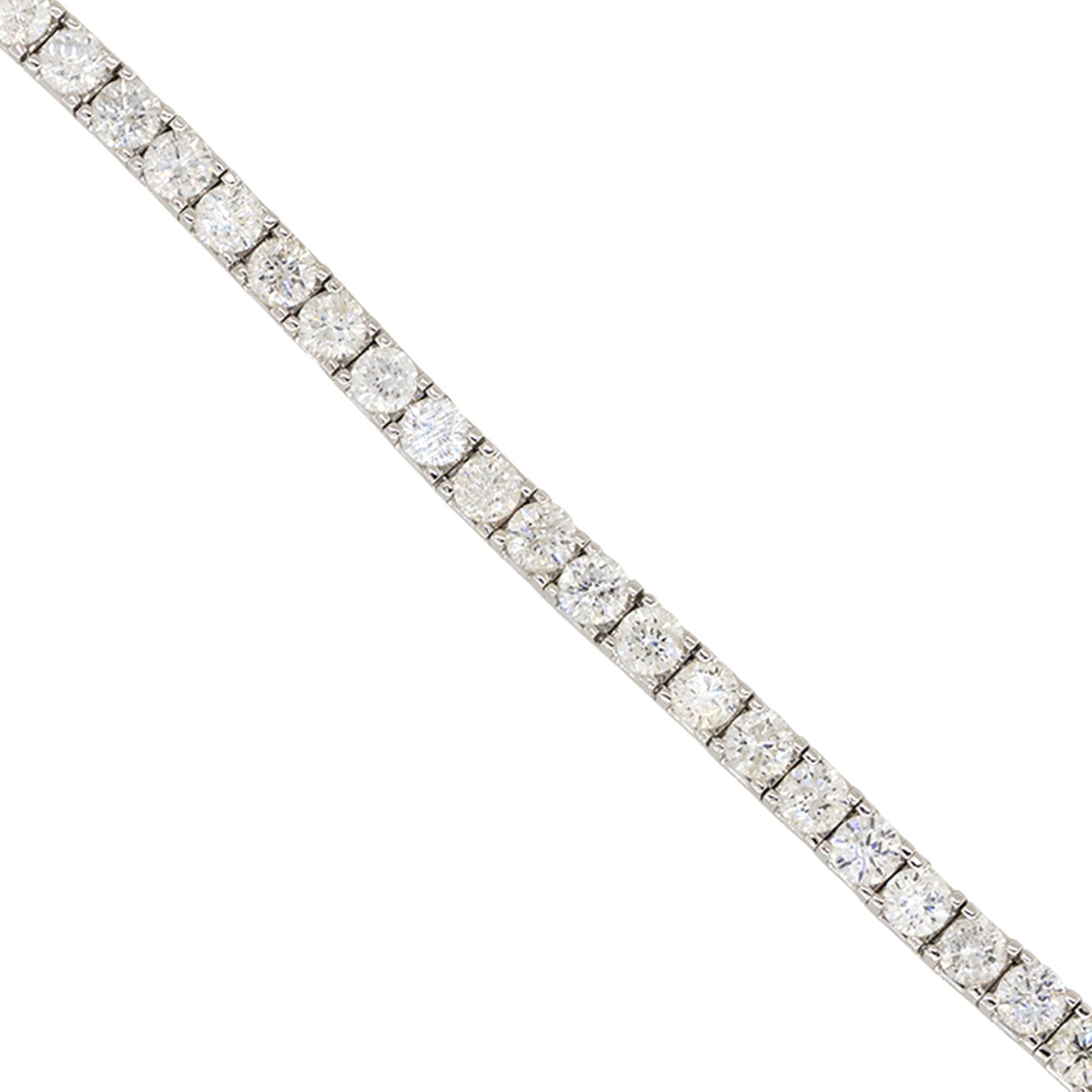 Material: 14k White Gold
Diamond Details: Approx. 10.00ctw of round cut Diamonds. Diamonds are G/H in color ands SI-I1 in clarity
Bracelet Measurements: 7 inches in length and 4 mm wide
Total Weight: 20.8g (13.3dwt)
Additional Details: This item