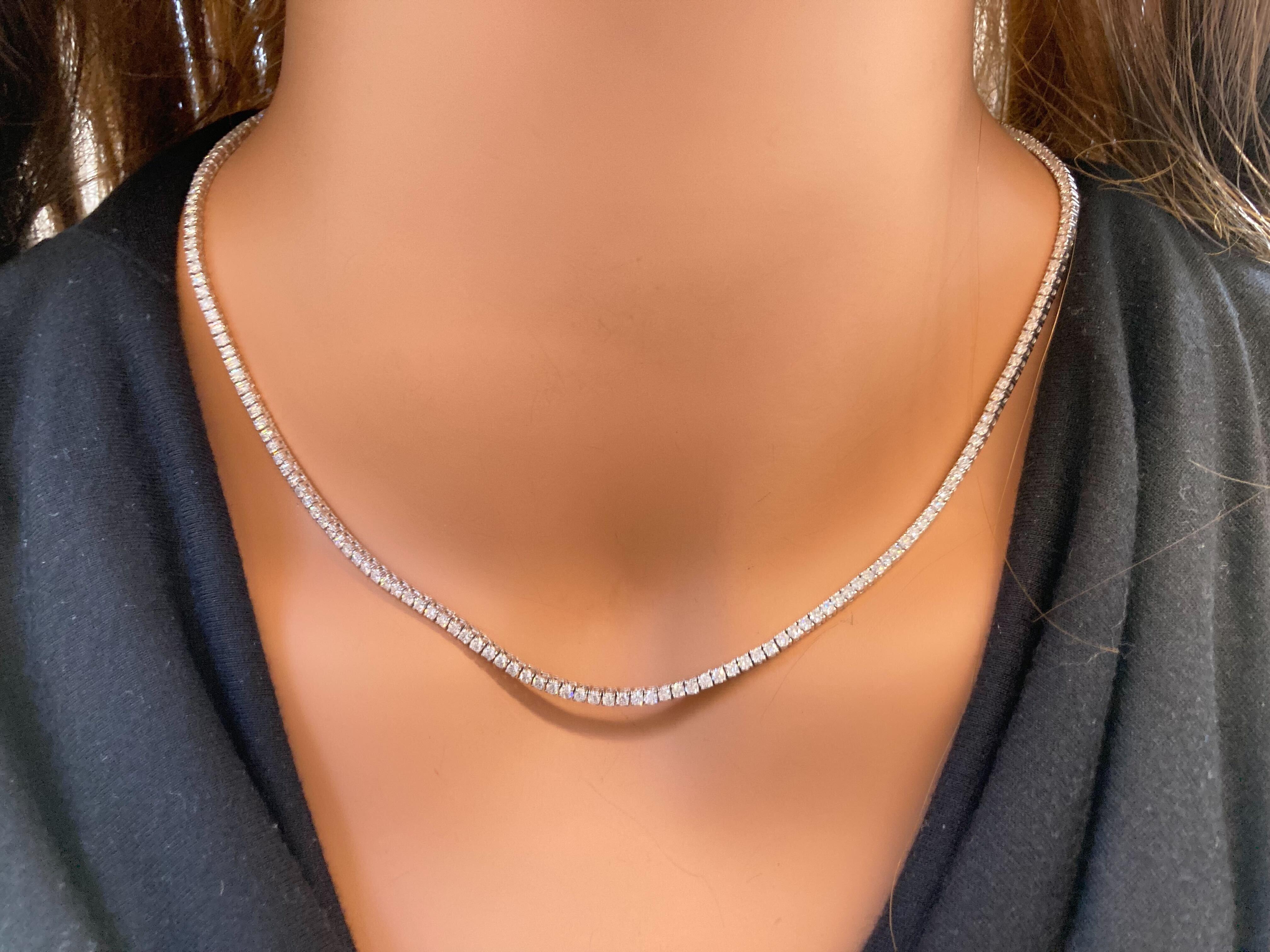 Introducing an extraordinary display of elegance and grandeur: our magnificent 10 carat round diamond Tennis Necklaces, meticulously crafted to adorn you with unparalleled beauty and luxury. Each necklace boasts a lavish total of 188 dazzling