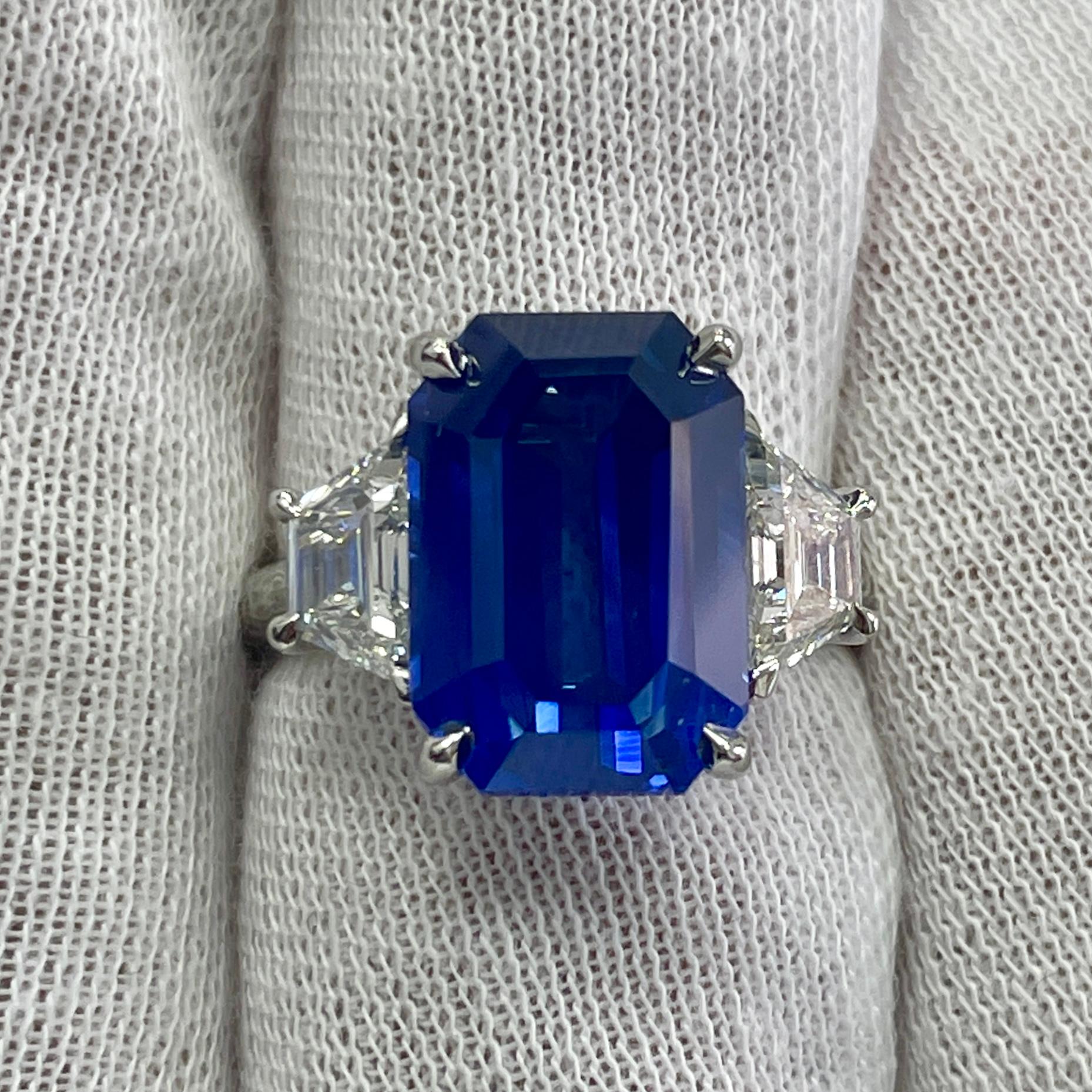 This is a cornflower blue emerald cut sapphire mounted in an elegant platinum ring with 1.04Ct of brilliant white diamonds. Suitable for any occasion!
