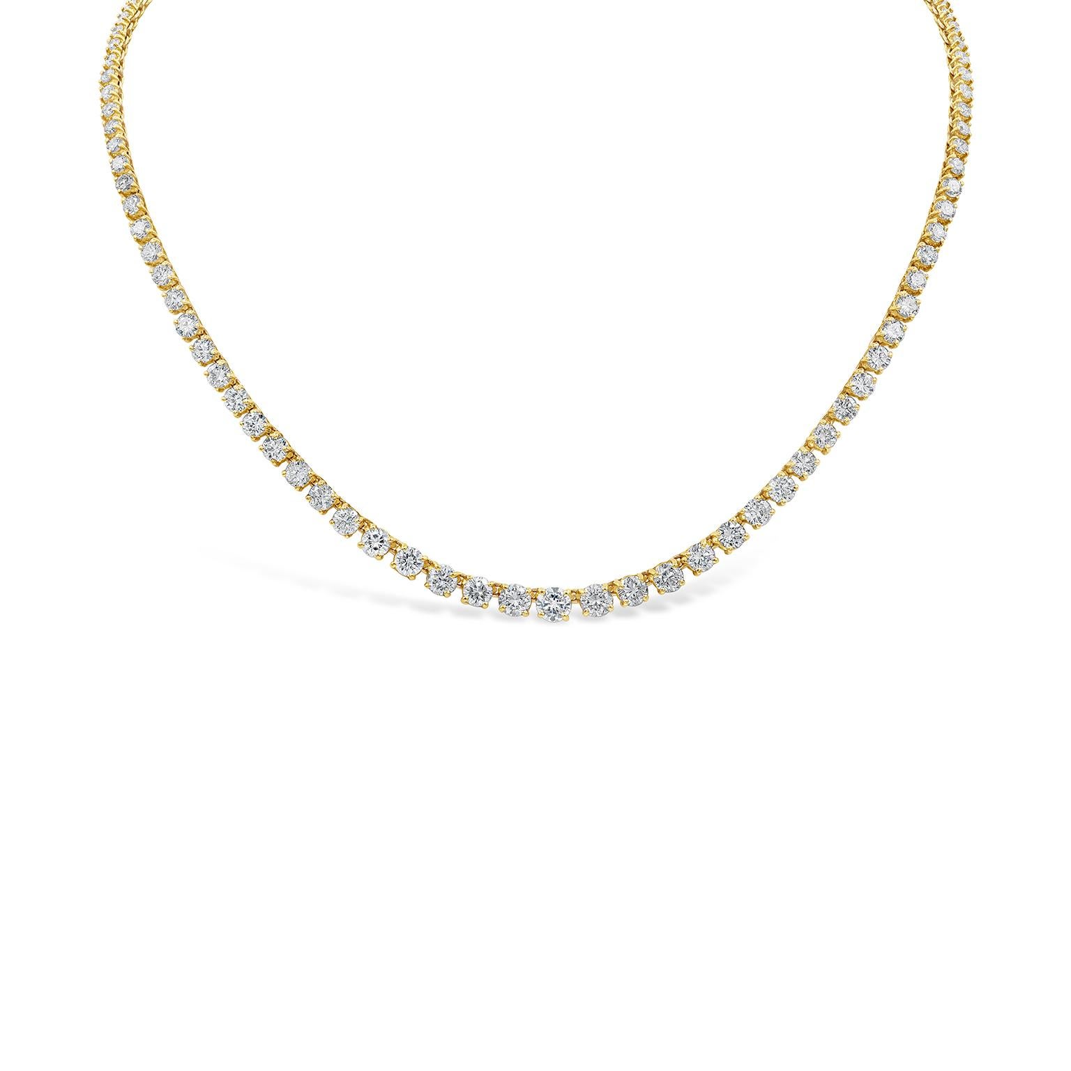 A chic and brilliant design showcasing round brilliant diamonds that graduate larger as it gets to the center. Diamonds weigh 10.04 carats total. Set in a seamless 18 karat yellow gold design for maximum brilliance.

Style available in different