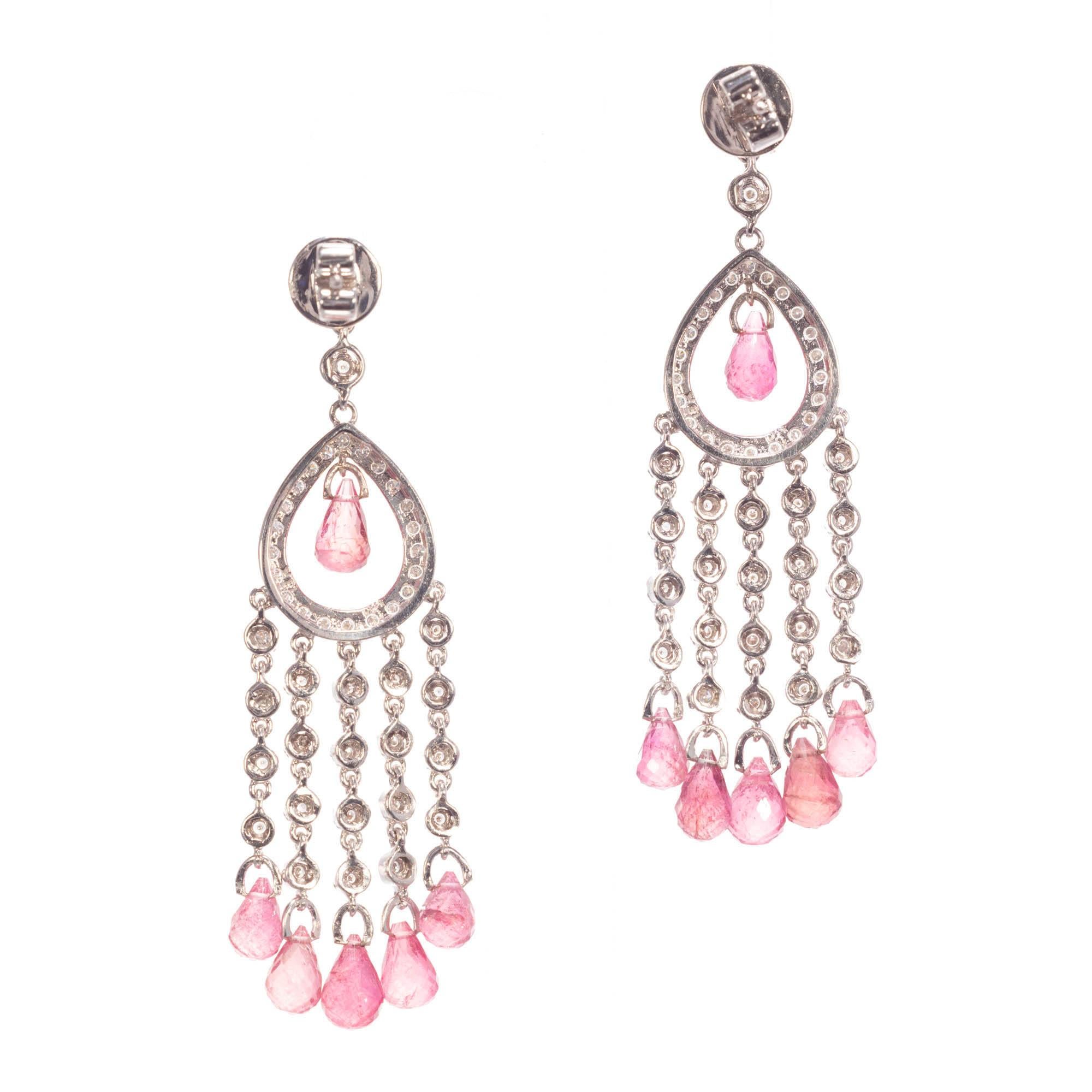 Diamond and tourmaline, Chandelier style dangle earrings in 18k white gold with bright full cut Diamonds and briolette cut pink Tourmaline.

88 round full cut Diamonds, approx. total weight 1.65cts, H, SI
12 pink Tourmaline Briolette’s, approx.