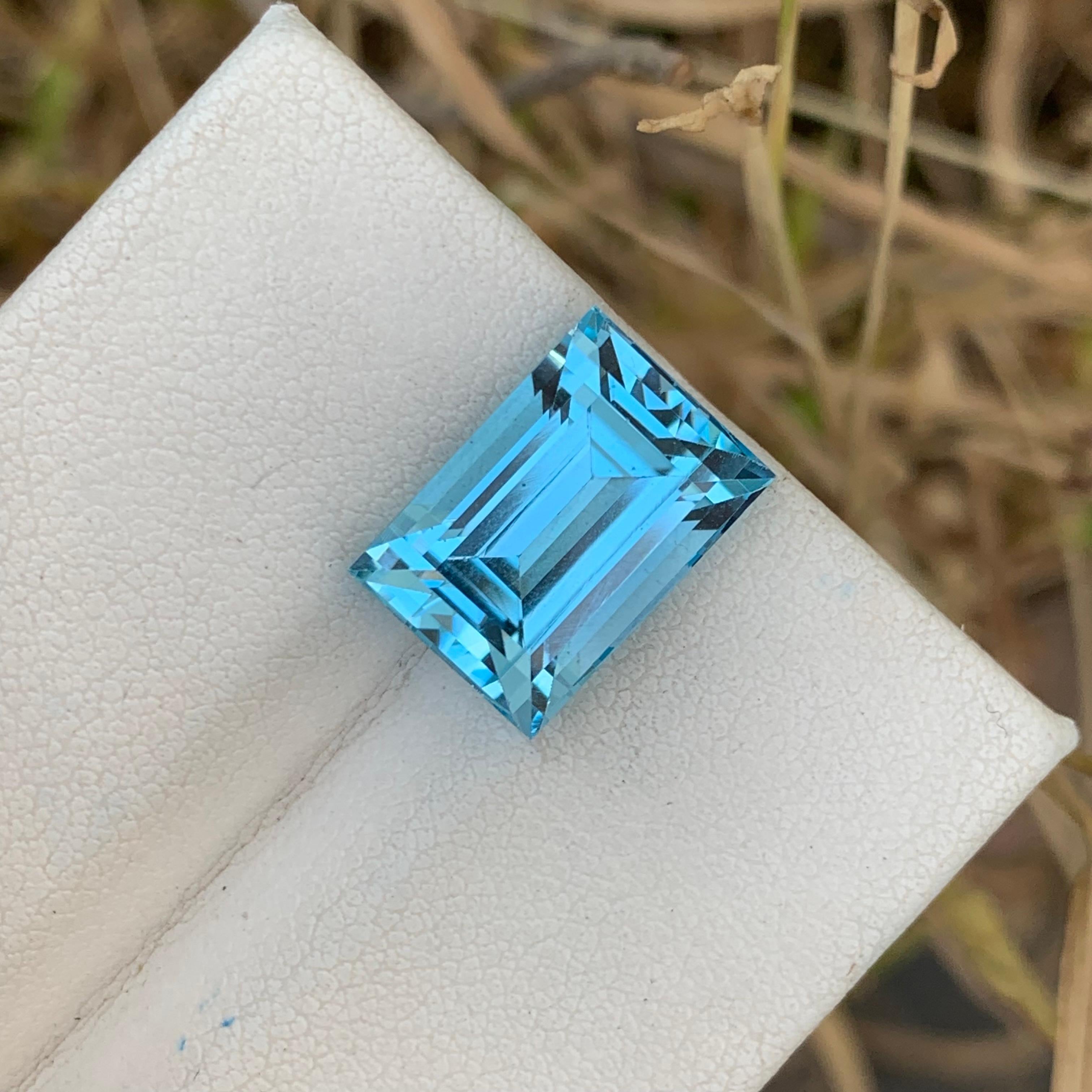 Loose Swiss Blue Topaz
Weight: 10.05 Carats 
Dimension: 13.5 x 9.4 x 8 Mm
Colour : Blue 
Shape: Baguette 
Certificate: On Demand 
Origin: Brazil 

Swiss blue topaz is a stunning gemstone known for its captivating hue and versatility in jewelry