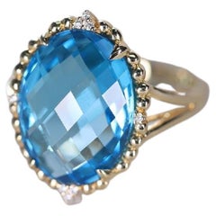10.05 Carat Swiss Blue Topaz and 0.03 Carat Diamond 14 Karat Yellow Gold Ring