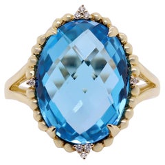Vintage 10.05 Carat Swiss Blue Topaz and 0.03 Carat Diamond 14 Karat Yellow Gold Ring