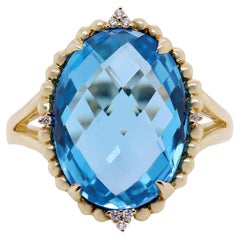 Bague en or jaune 14 carats avec topaze bleue suisse de 10,05 carats et diamants de 0,03 carat