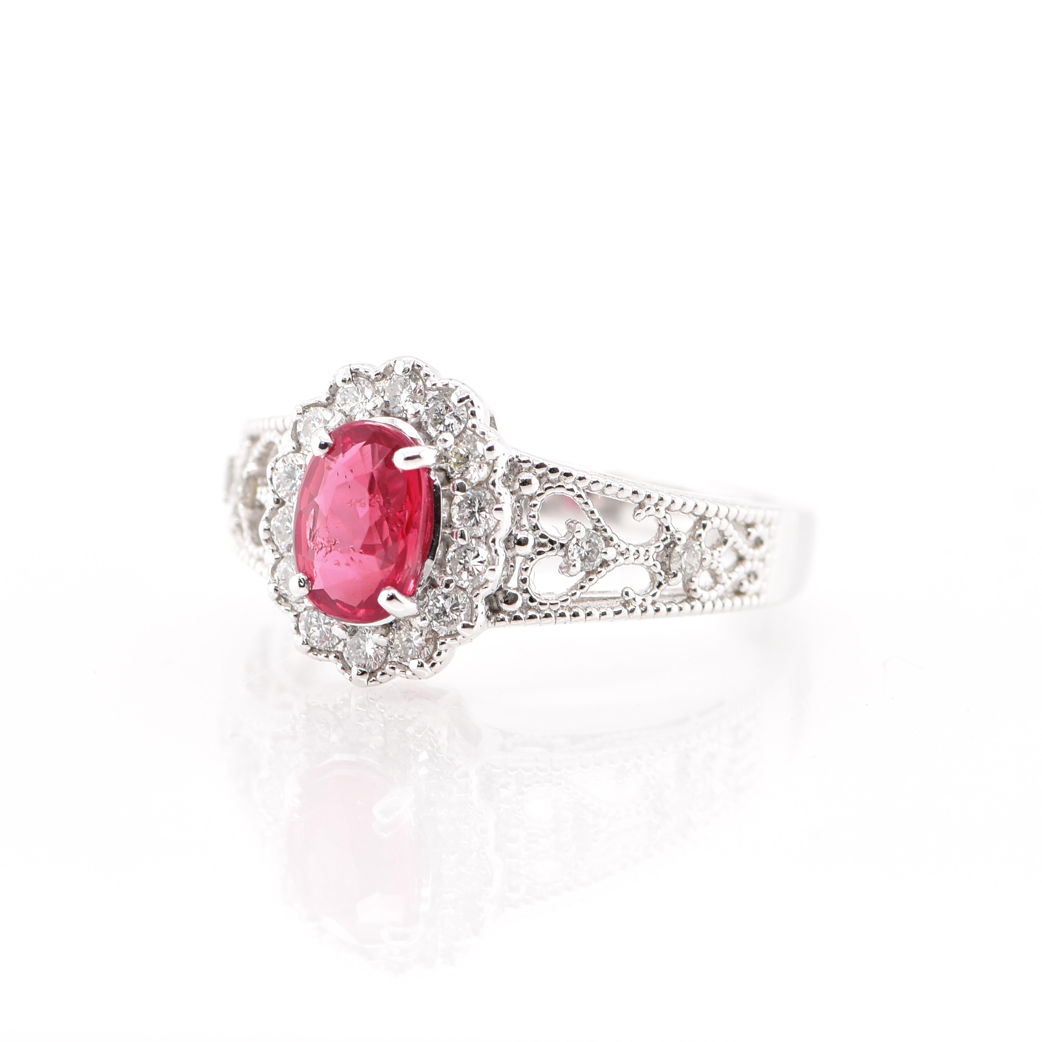 A beautiful Cocktail Ring featuring a 1.006 Carat No Heat (Untreated) Ruby and 0.30 Carats of Diamond Accents set in Platinum. Rubies are referred to as 