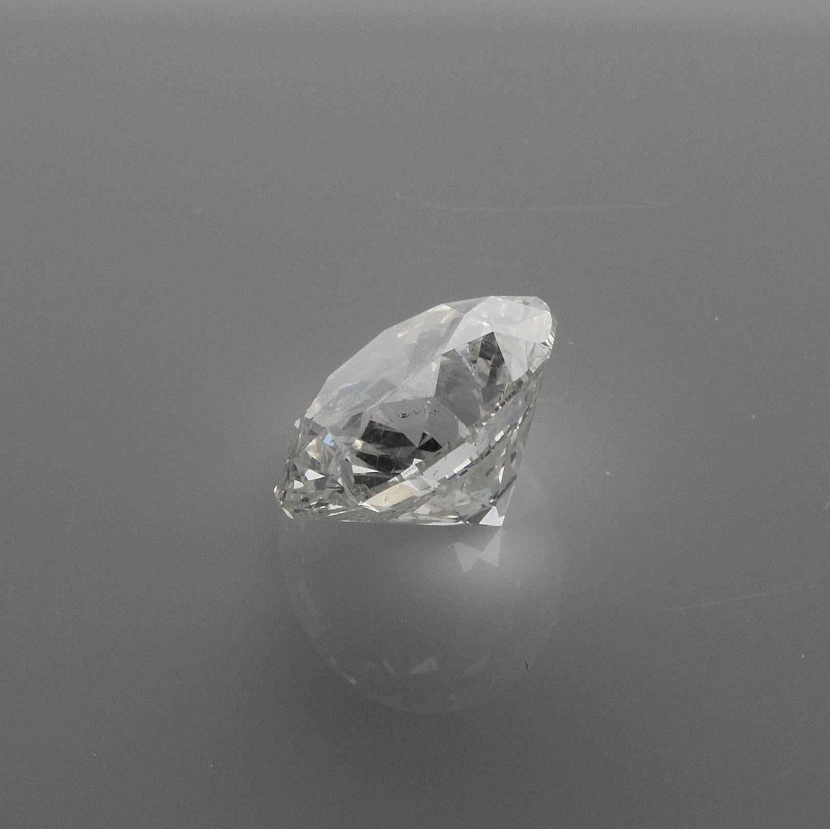 Contemporary 10.06 Carat Round Brilliant Cut J SI2 IGI Certified Natural Diamond For Sale