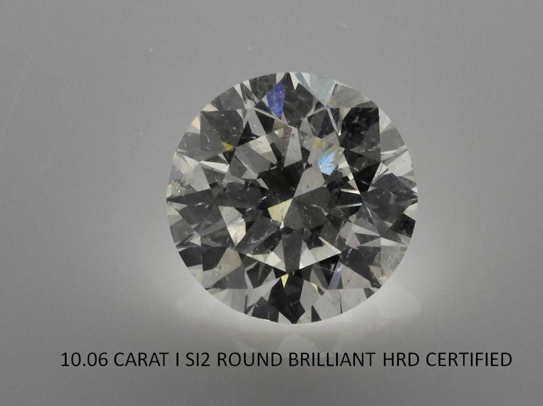 10.06 Carat Round Brilliant Cut J SI2 IGI Certified Natural Diamond For Sale 1