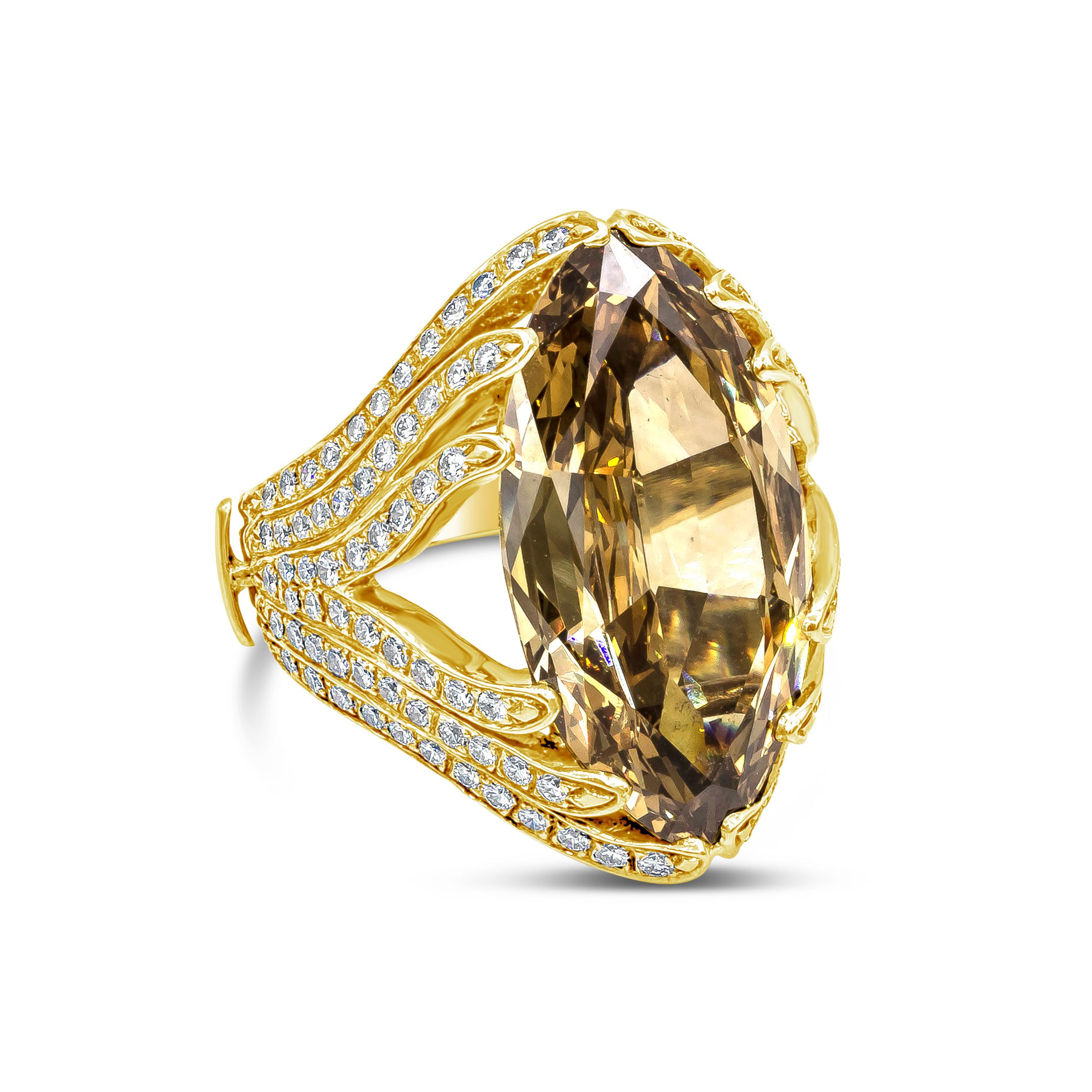 An important and color-rich ring showcasing a GIA Certified 10.07 carat total marquise cut diamond,  Fancy Deep Brown Yellow Color, and SI1 in Clarity. The center stone is set in an intricately-designed band accented with fine dazzling round