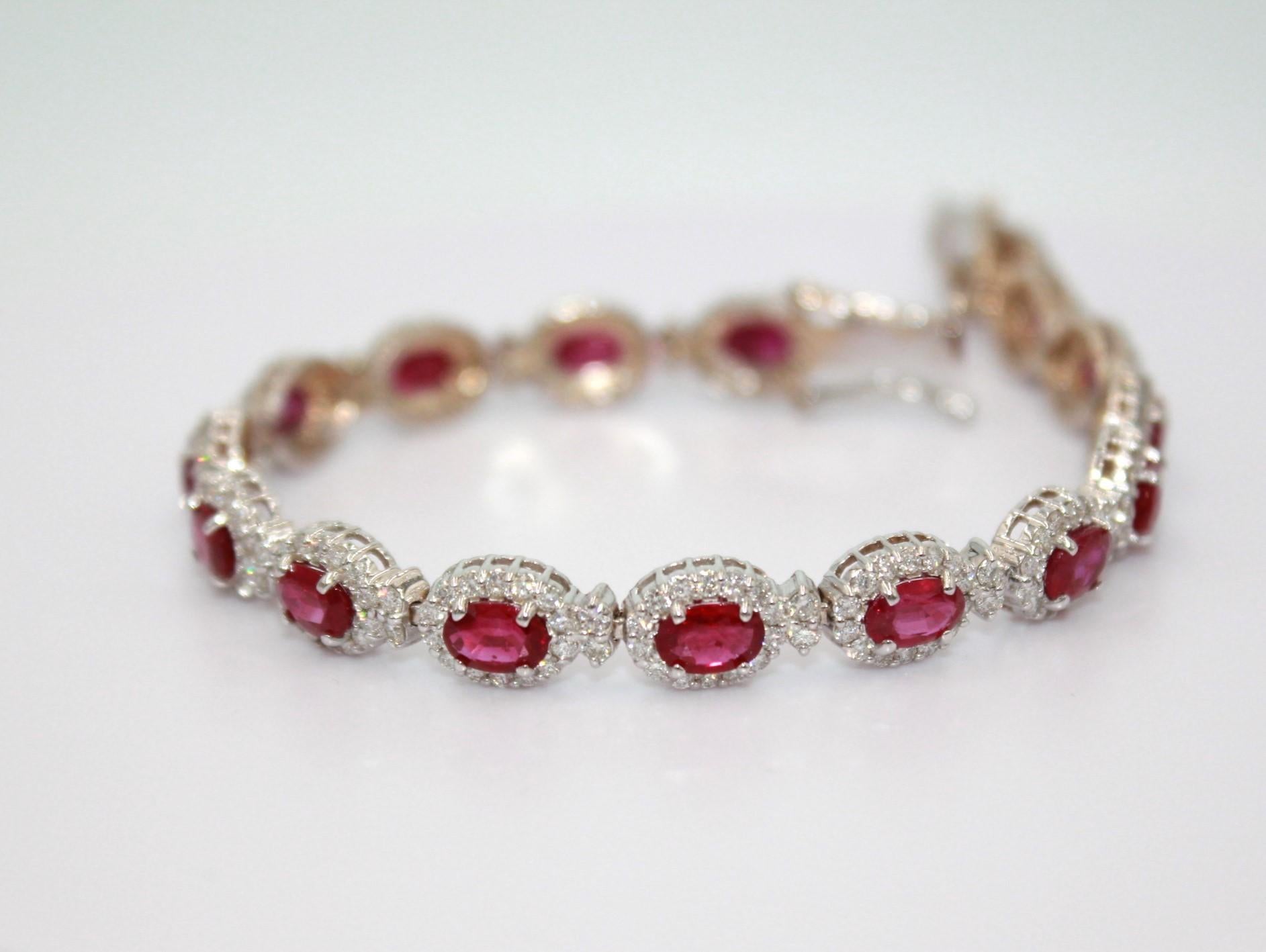 10.08 carats oval shaped Burma Ruby with 256 round diamonds, totaling a diamond weight of 3.24 carats. 

This gorgeous Ruby & Diamond Bracelet will highlight your uniqueness and elegance. 

Item Details:
- Type: Bracelet
- Metal: 18K Gold 
- Gram: