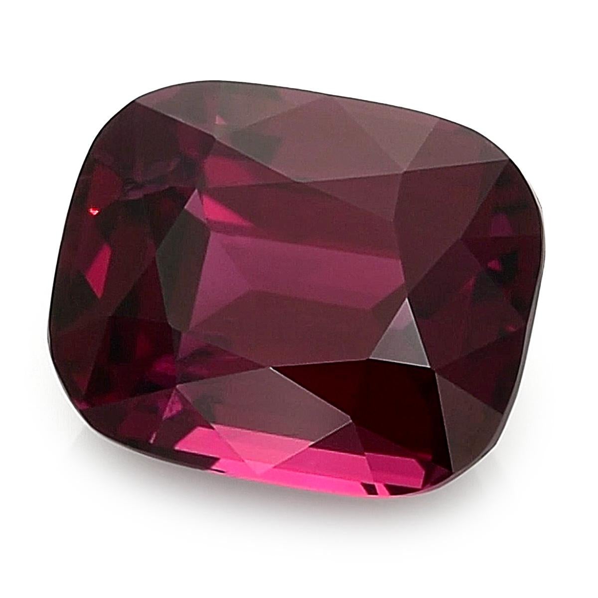 Discover an extraordinary Natural Garnet, boasting an impressive 10.08 carats. This gem, cut in a stunning Cushion shape with measurements of 13.26 x 10.78 x 7.66 mm, showcases a Brilliant/Step cut that enhances its brilliance. The intense Red
