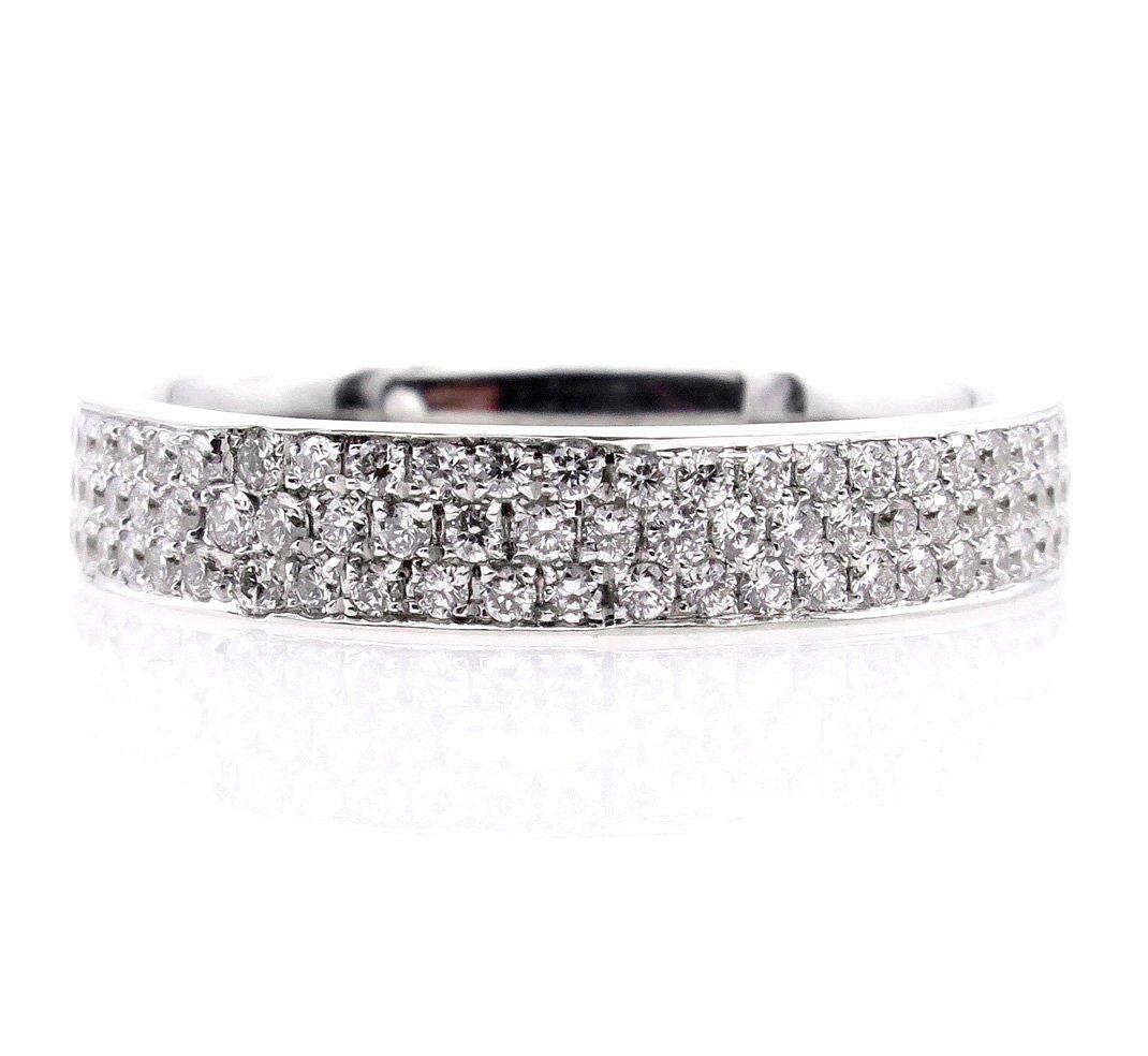 GORGEOUS 18k White Gold Wedding Band featuring a triple row of a single line of round brilliant natural white diamonds in pave set with comfort fit band, by Henri Daussi.
This ring contains approx. 1.00cttw, F-G, VS1-VS2 diamonds that are set very