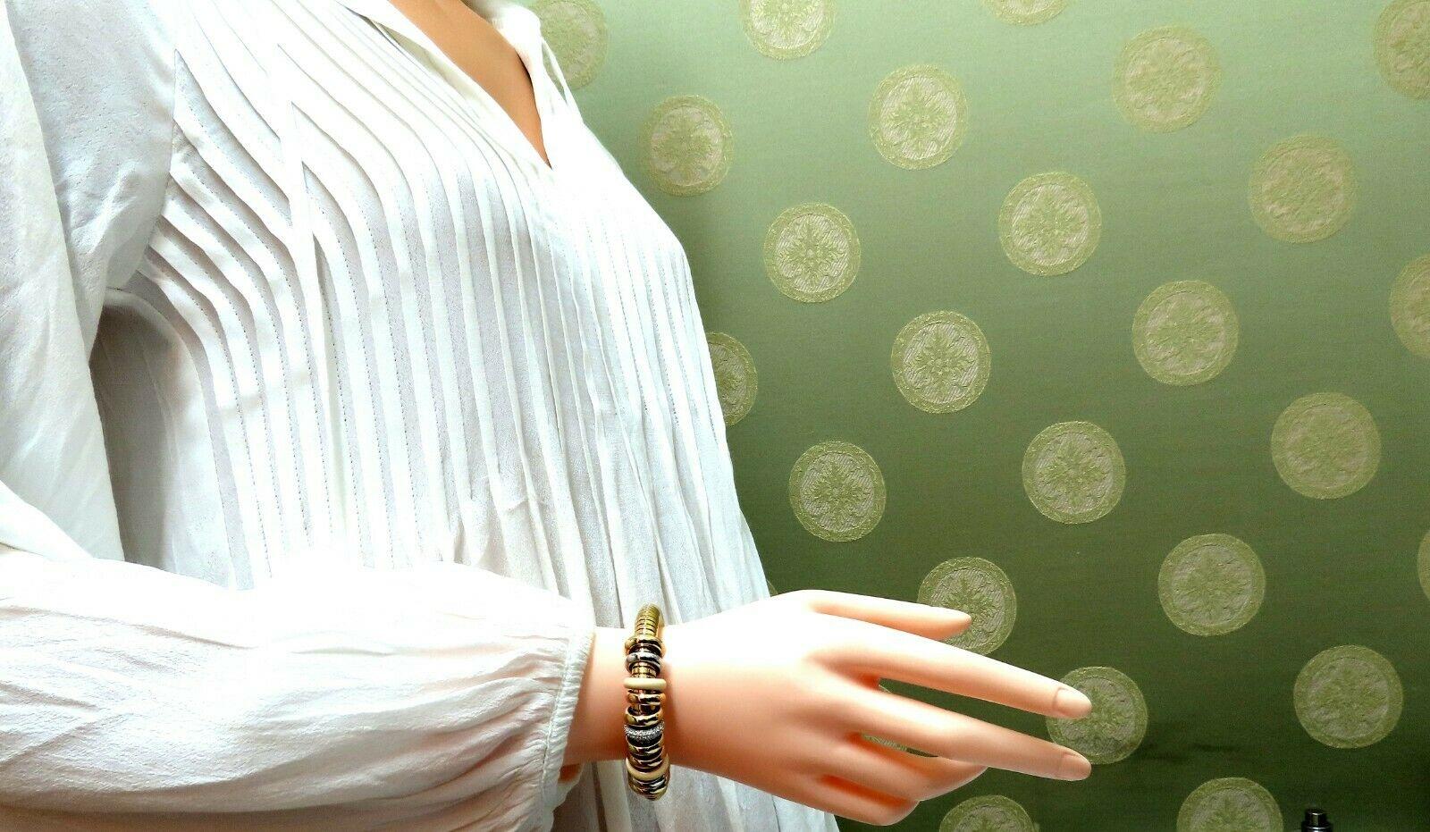 da uomo o donna 1.00ct Diamonds Ladies Accordion Bangle Bracciale 18 Karat Rolling Rolle Float in vendita