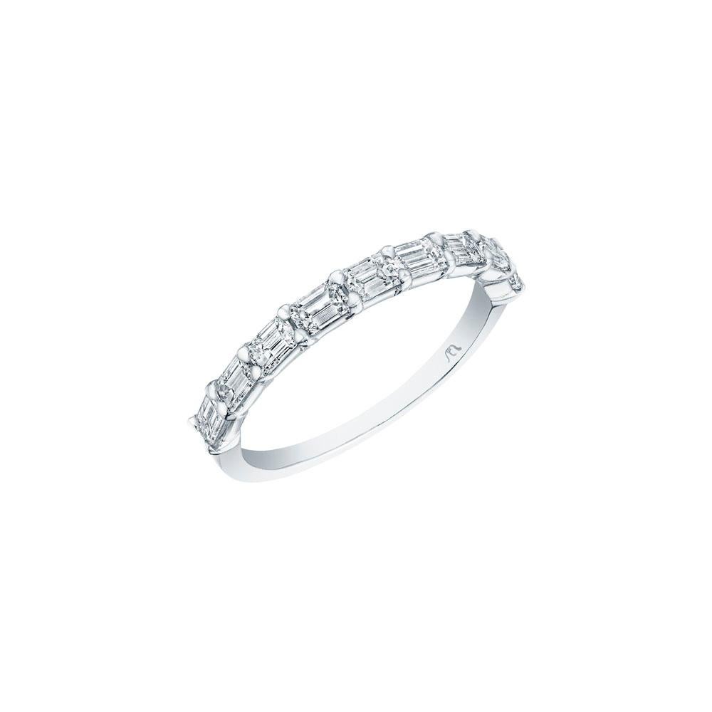• Crafted in 18KT gold, this band is made with 9 horizontally set emerald cut diamonds, and has a combining total weight of approximately 1.00 carat. The diamonds are set into a shared setting. Worn beautifully on its own or stacked with other