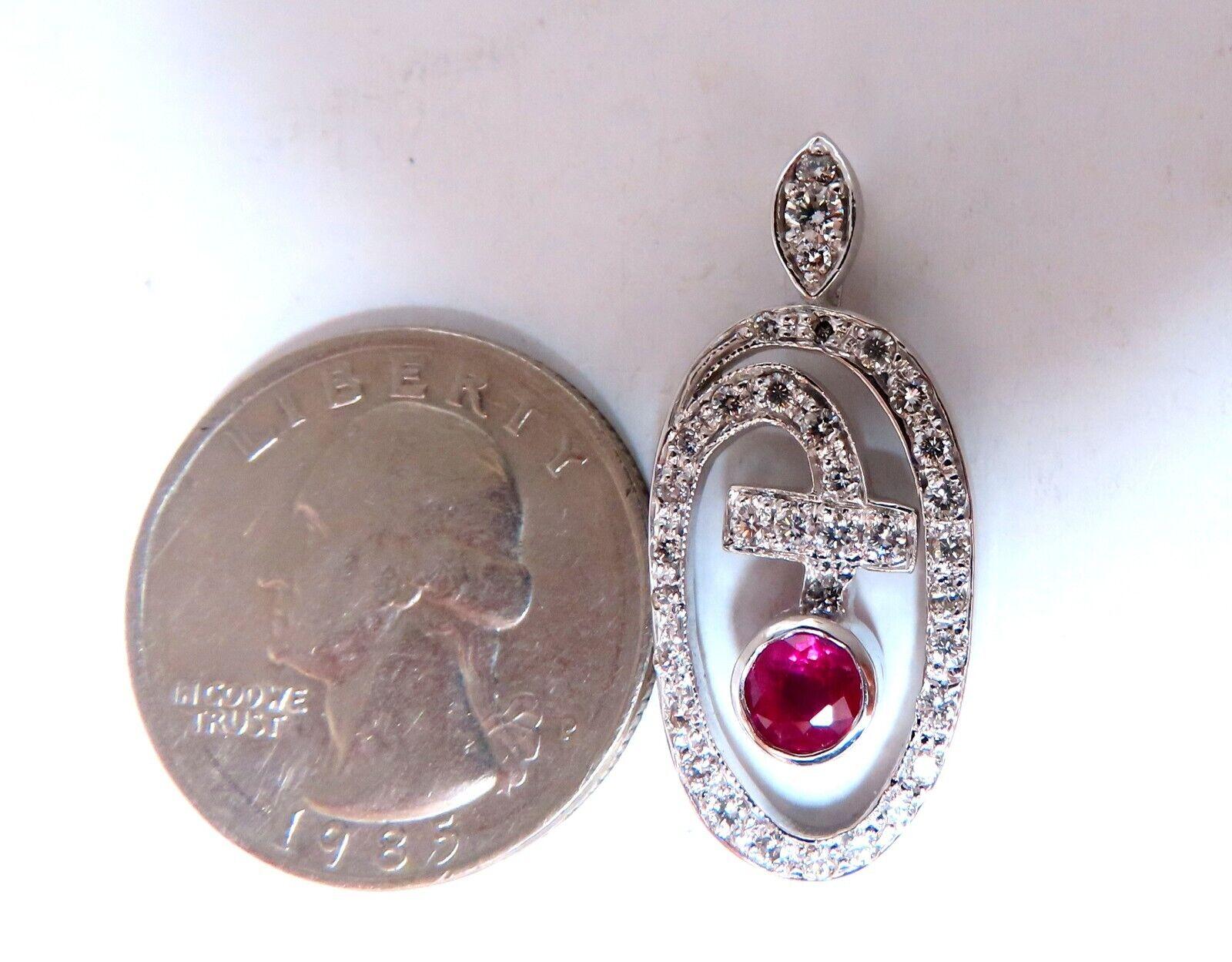 Natural Round Rubies & Diamond Cluster Pendant.

.50ct Rubies.

Natural & Untreated

.50ct round diamonds.

G-color Vs-2 clarity.

Brilliant rounds, full cuts

clean clarity & transparent

Pendant: 30 x 13mm

total weight: 3.6 grams.